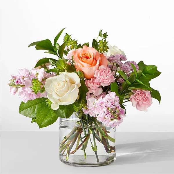 French Market Bouquet - Serene and fragrant, this arrangement blends soft pastels to create a gift that is worthy of all occasions.  Details The Standard Bouquet is approximately 11&quot;H x 12&quot;W. Designed by florists, ready to display. For long–lasting blooms, replace the water daily. We suggest trimming the stems every couple days. Pet Safety Precautions: This bouquet or plant may include flowers and foliage that are known to be toxic to pets. To keep them safe, be sure to keep this arrangement out of your pet's reach.  Bloom Details Rose Stock Carnation
