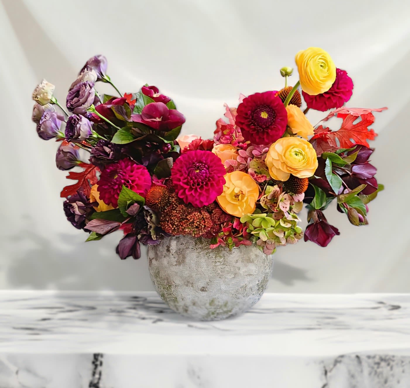 Velvet Dawn Velvet Dawn - Dahlias, Lisianthus, Ranunculus, Hydrangea, and more in rustic ceramic Vase.