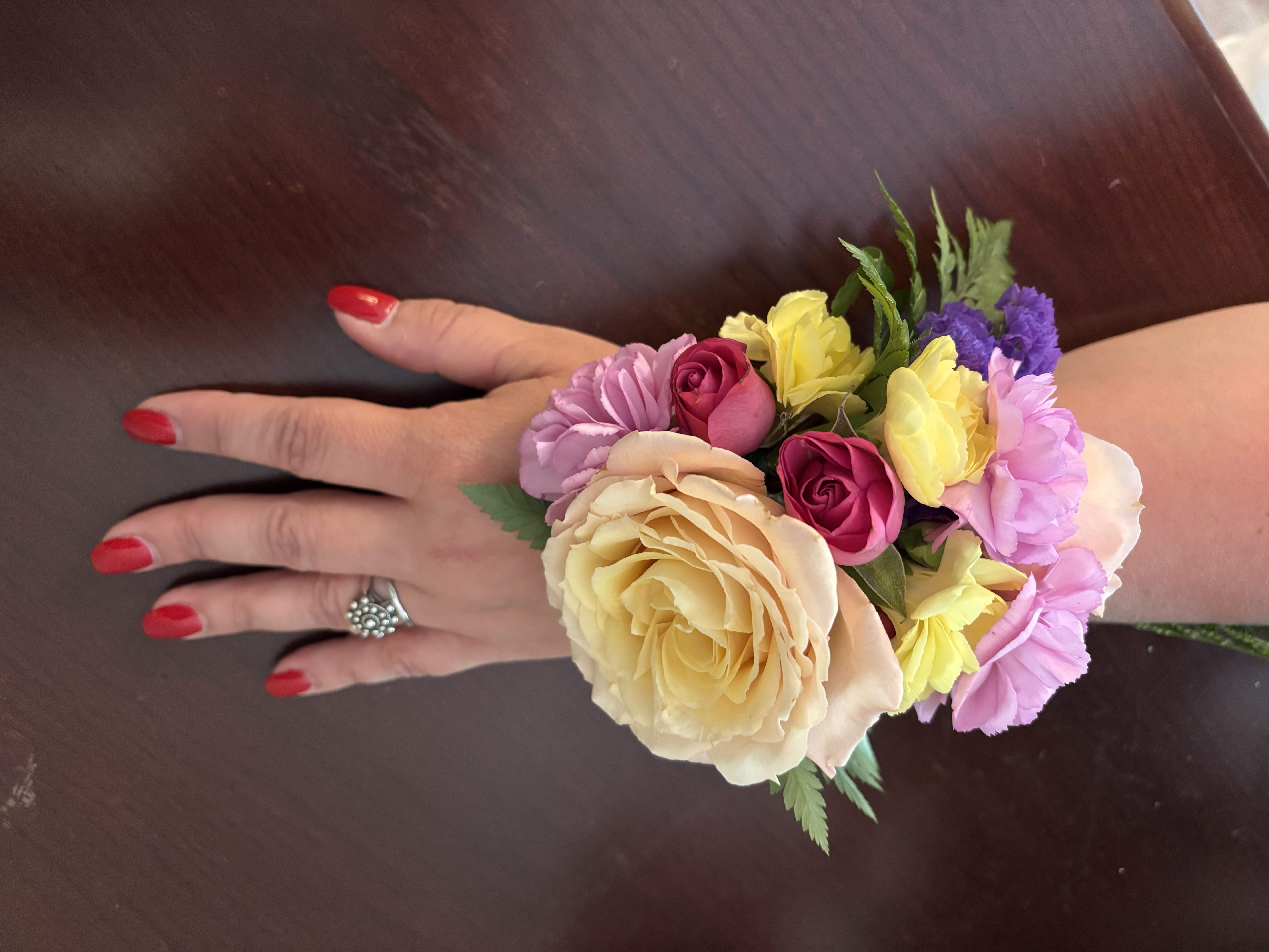 Colorful wrist corsage. Colorful wrist corsage. - Colorful wrist corsage, you can tell us your preference and we will make a stunny corsage for your special occasion.