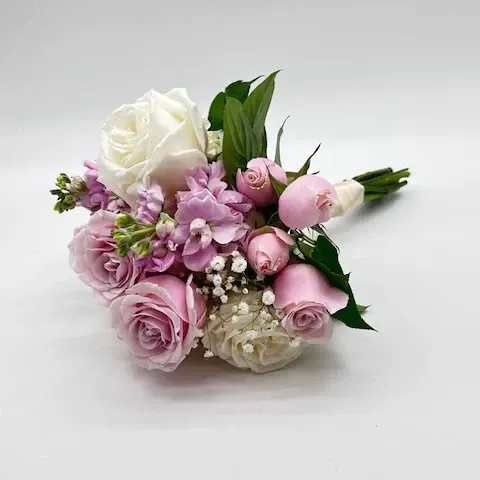 Pink and White Nosegay - Elegant look with a variety of fresh pink and white florals. When ordering please specify your choice of satin ribbon color under special instructions or it will be wrapped in a neutral color. Designers may need to implement substitutions, however will follow the general arrangement style and color theme. Standard price point is pictured.