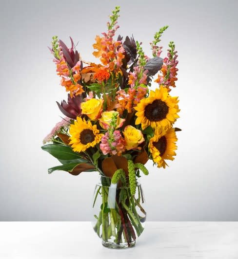 Hello Fall by BloomNation™ - Say hello to the new season with this tower of fall flowers! Featuring a wide array of seasonal blooms, this arrangement has something for everyone, and is sure to bedazzle whoever welcomes it into their life. Say “hello” to someone in your life with this fall flower tower. 