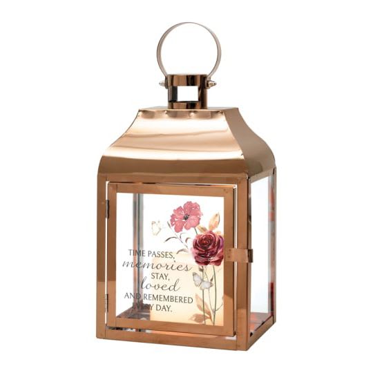 Lantern - 'Time Passes' (Copper) Lantern - 'Time Passes' (Copper) - Lantern - ' Time passes, memories stay, loved and remembered every day. ' Flameless LED candle lantern made with high-quality metal finish. Built-in automatic timer, 6hrs ON/18 hrs OFF. (Batteries included) Indoor use only. 57682 Approximately 6"W x 12"H