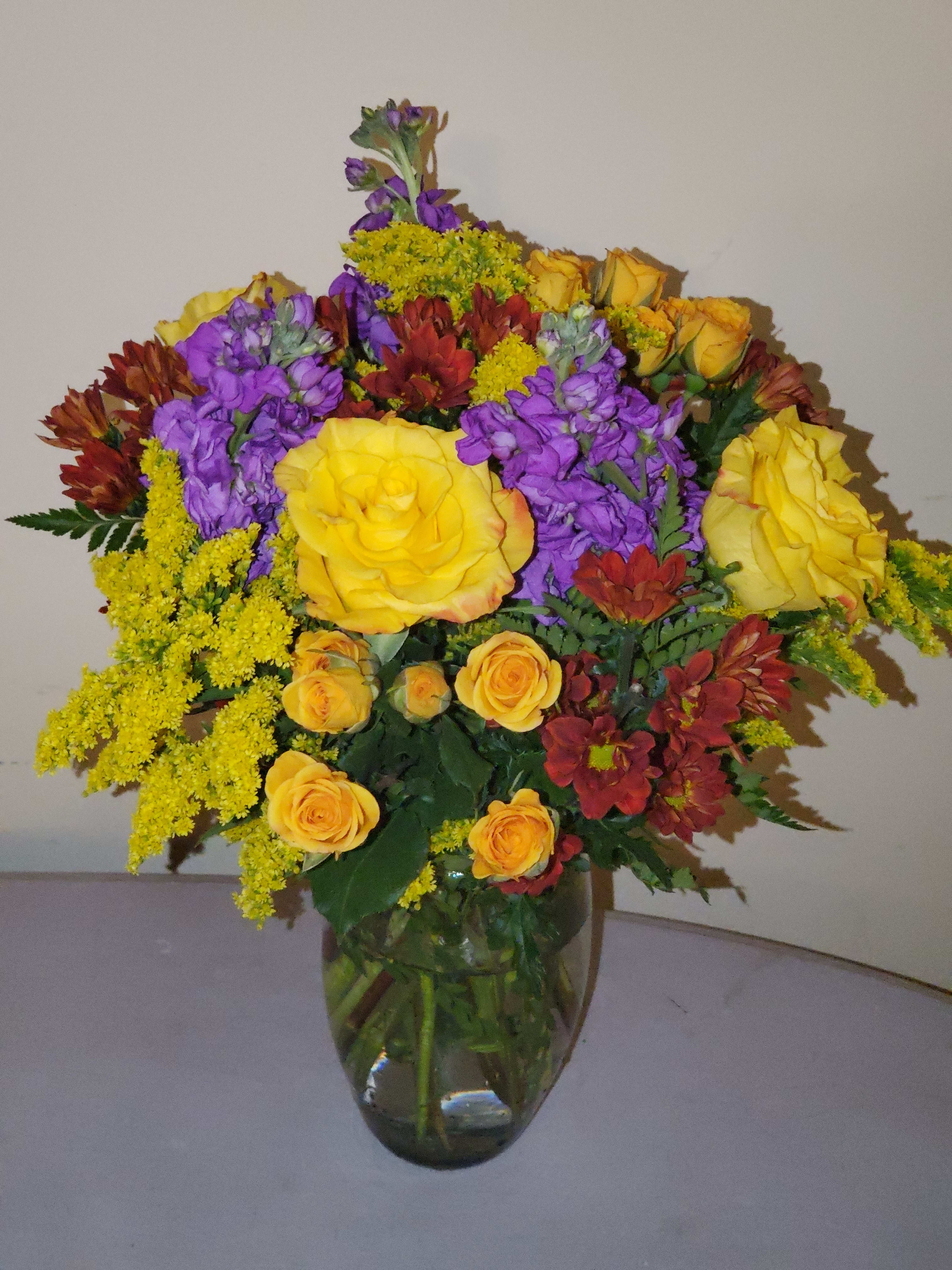 Fall is here - Low cylinder with nice fall color flowers 