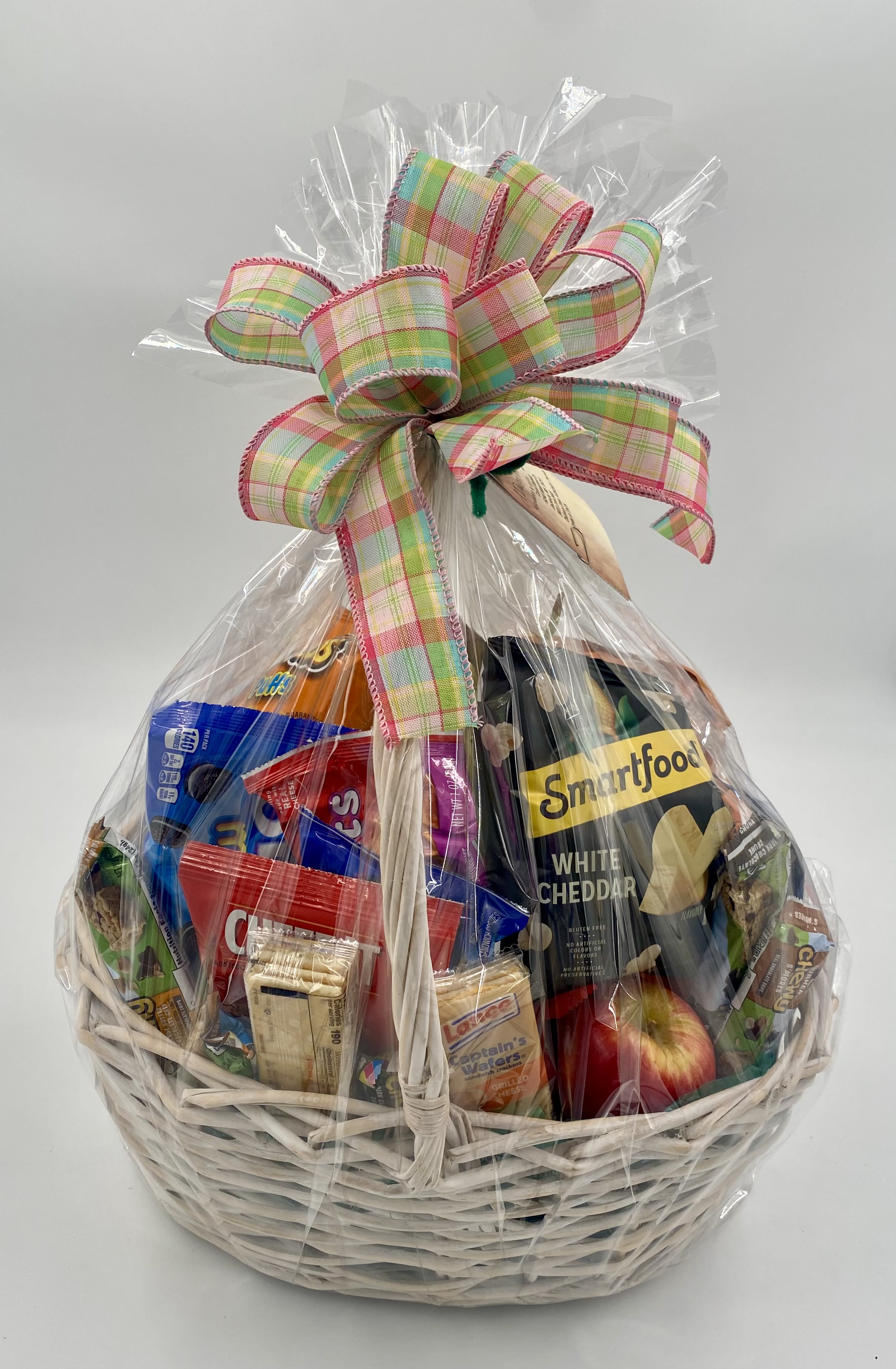 Candy, Fruit, & or Snack Basket Candy, Fruit, & or Snack Basket - A customizable assortment of Candy, Fruit, or Mixed Snacks. Please note: Snack, Fruit and Candy varieties may be substituted based on seasonal and daily availability. We always ensure your arrangement is of equal or greater value and just as beautiful.