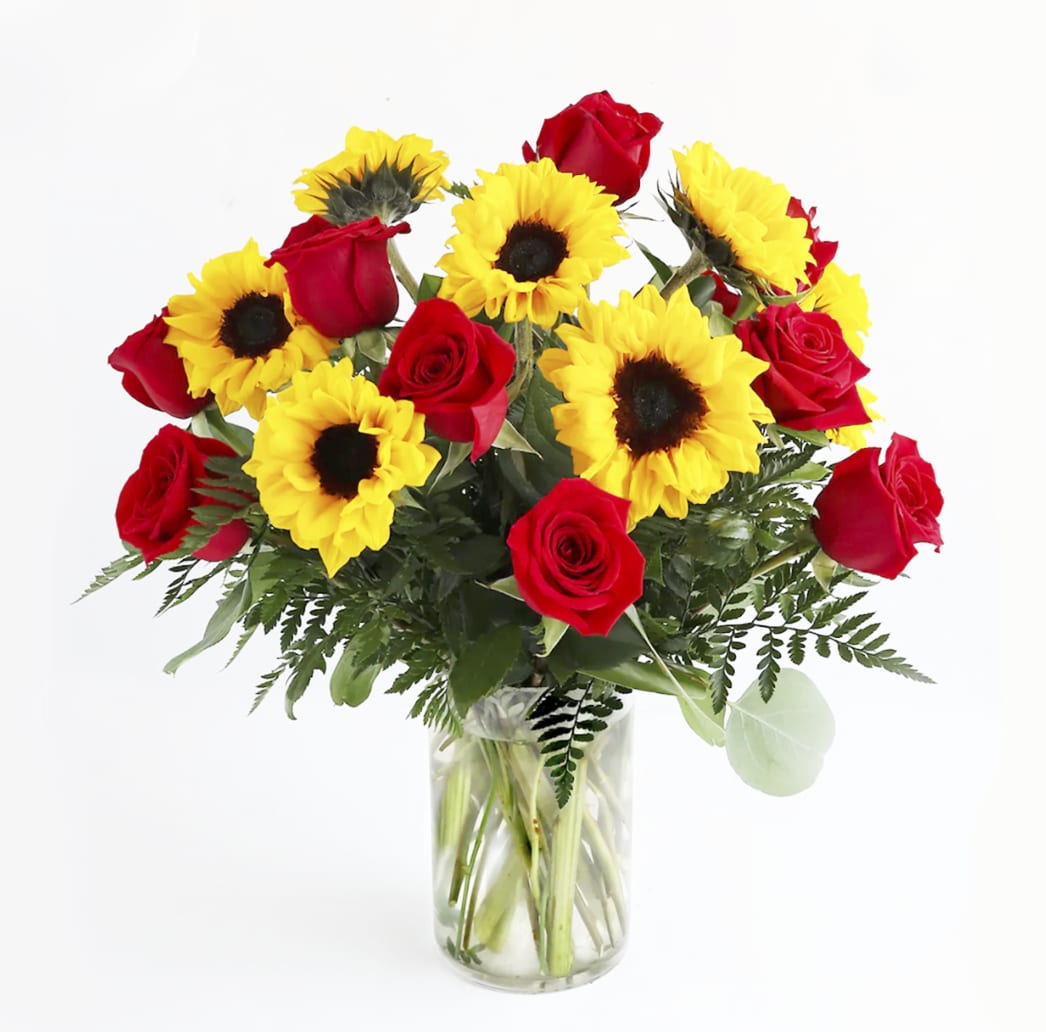 You are my Sunshine You are my Sunshine - You Are My Sunshine provides the perfect combination of everyone's favorite flowers: roses and sunflowers. This beautiful display of floral features 10 red roses and 8 dazzling sunflowers arranged with fresh greenery in a glass vase.
