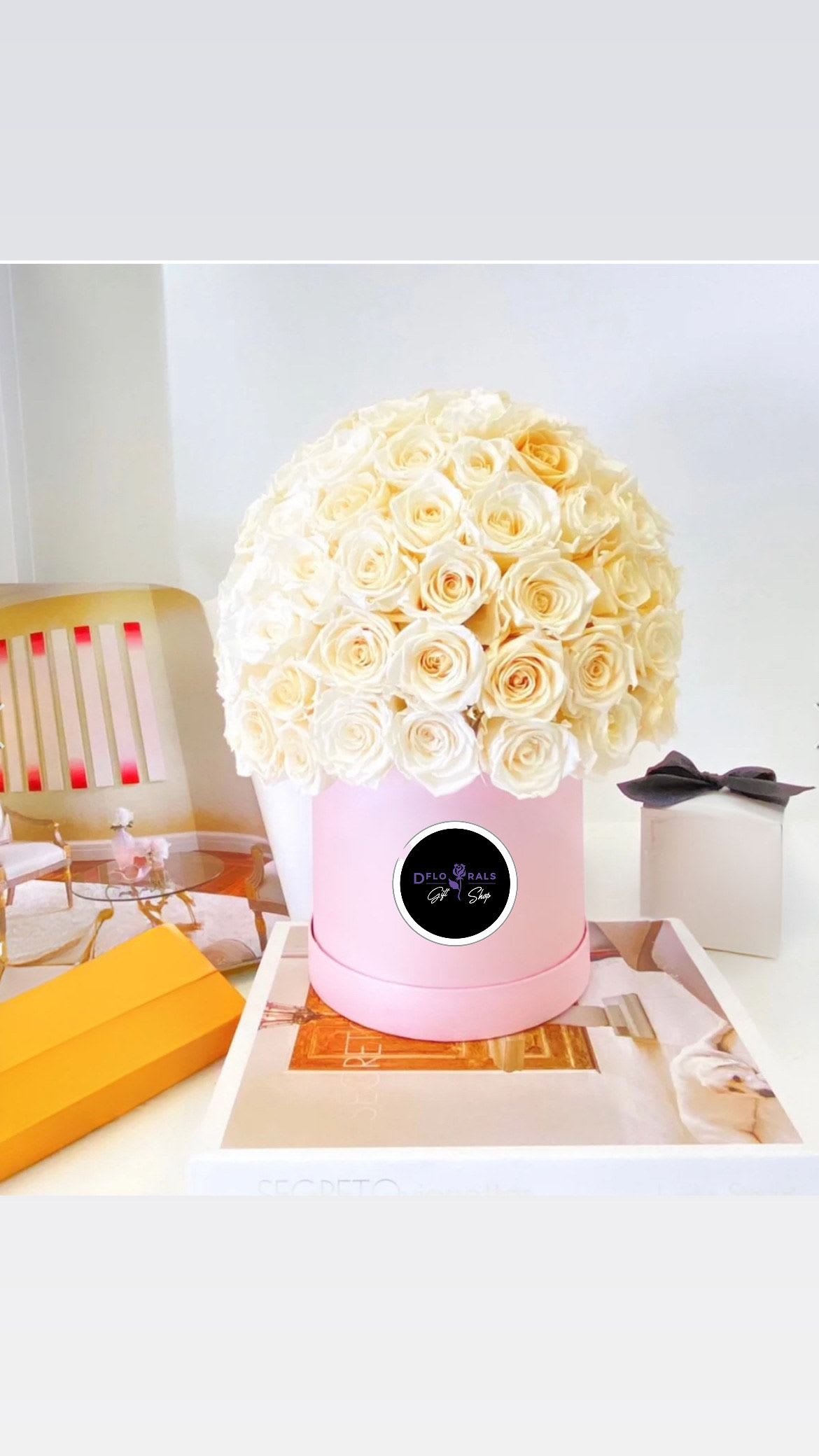 The Fancy Blooming White The Fancy Blooming White - Containing 65-70 Pure Ecuadorian roses gift the perfect and utmost elegant box to a loved one. "NOTICE" We are dedicated to delivering your emotional sentiments with the utmost care, ensuring that each arrangement is fresh, beautiful, and arrives on time. Due to the natural variability of flowers, as well as seasonal and regional availability, substitutions may occasionally be necessary. Rest assured, any substitutions will be of equal or greater value, and we will make every effort to preserve the overall design, including the shape, size, style, and color combinations of the arrangement. In the case of single-variety arrangements, the specific variety will take precedence over color to maintain the intended look and feel. Thank you in advance for understanding that flowers are a natural product and may vary slightly in appearance.