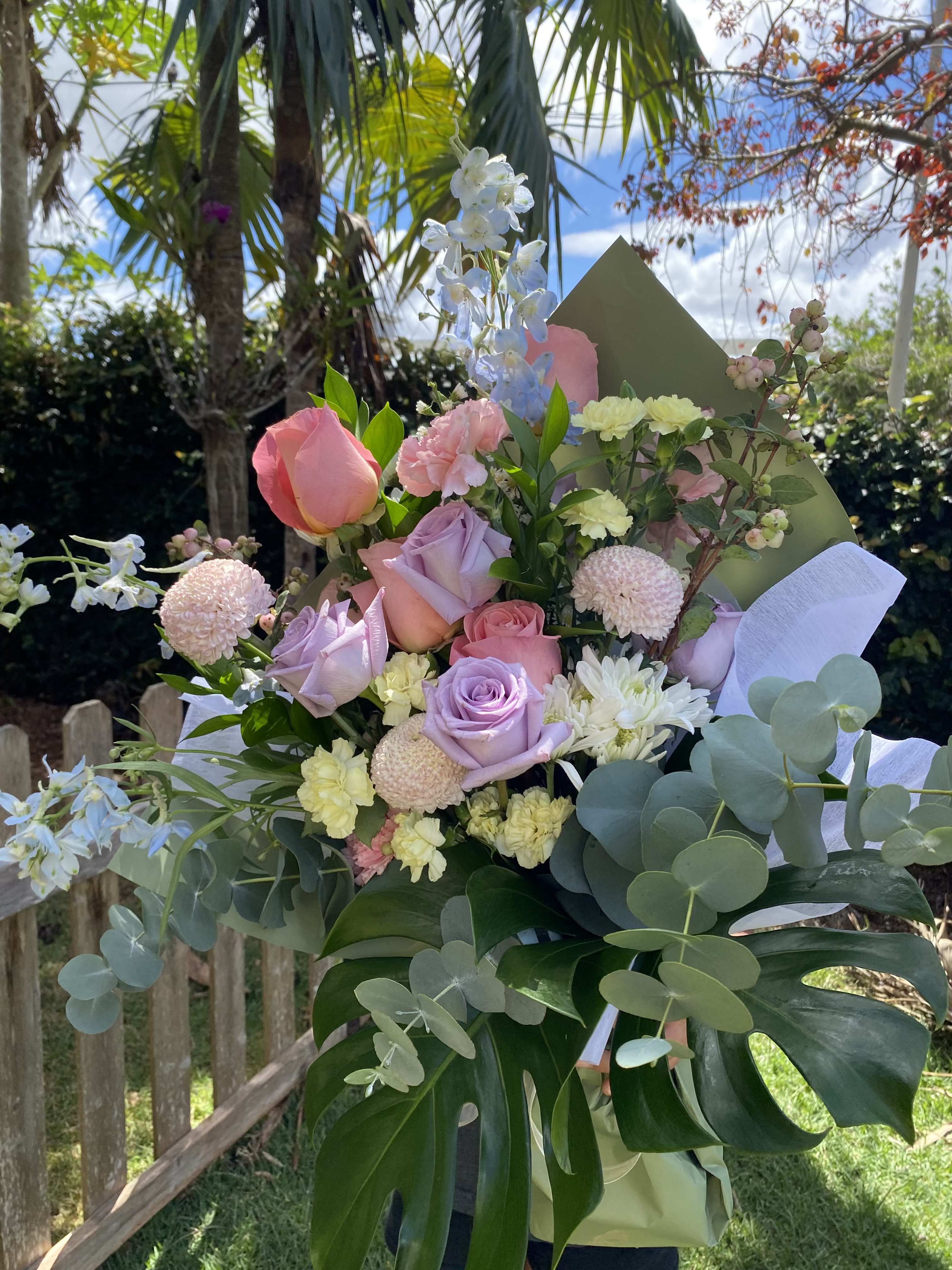 Hand wrapped bouquet Hand wrapped bouquet - Hand wrapped bouquet in any color scheme just let us know what you need and we will choose the best blooms in season.   Designs will vary