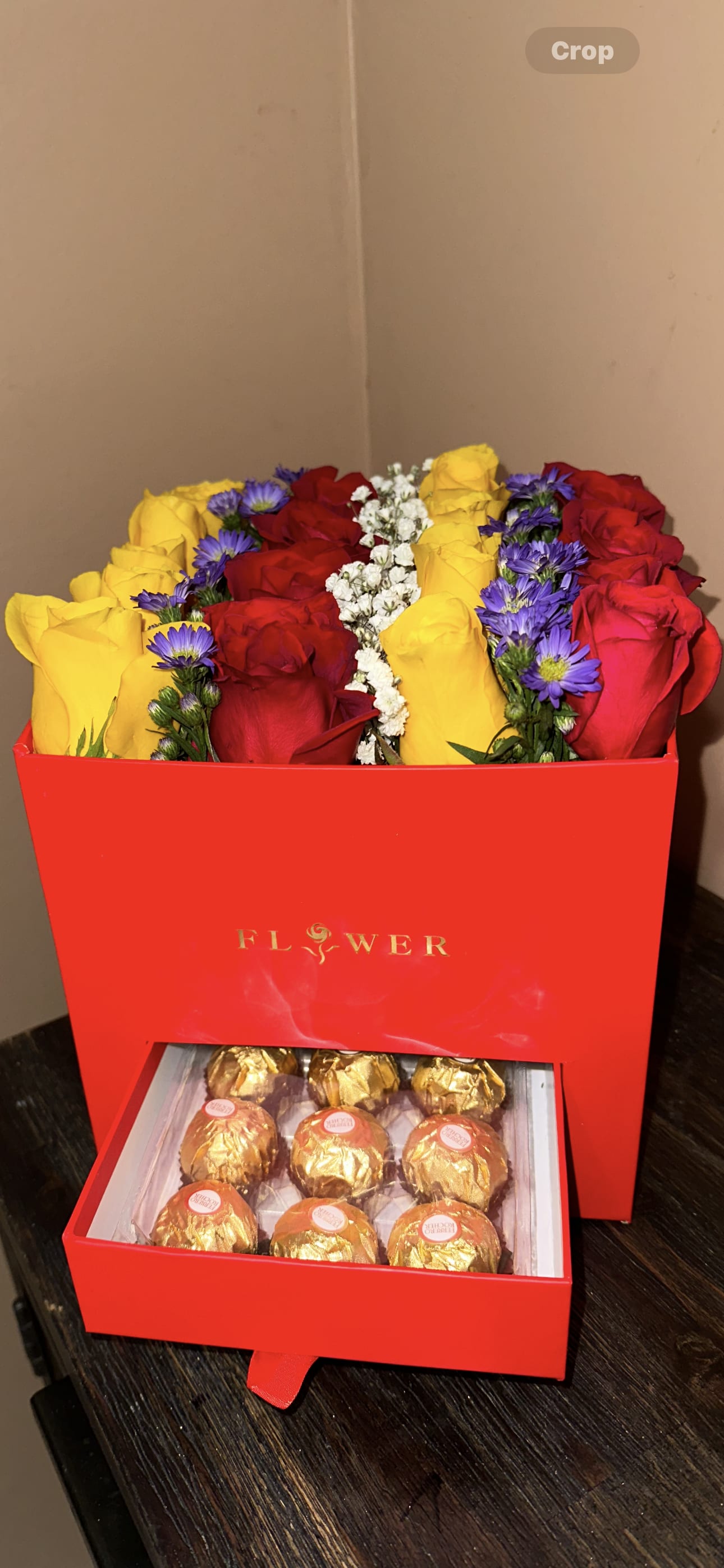 Lovely rainbow  - Delux rainbow roses with filler and chocolate perfect for somebody special
