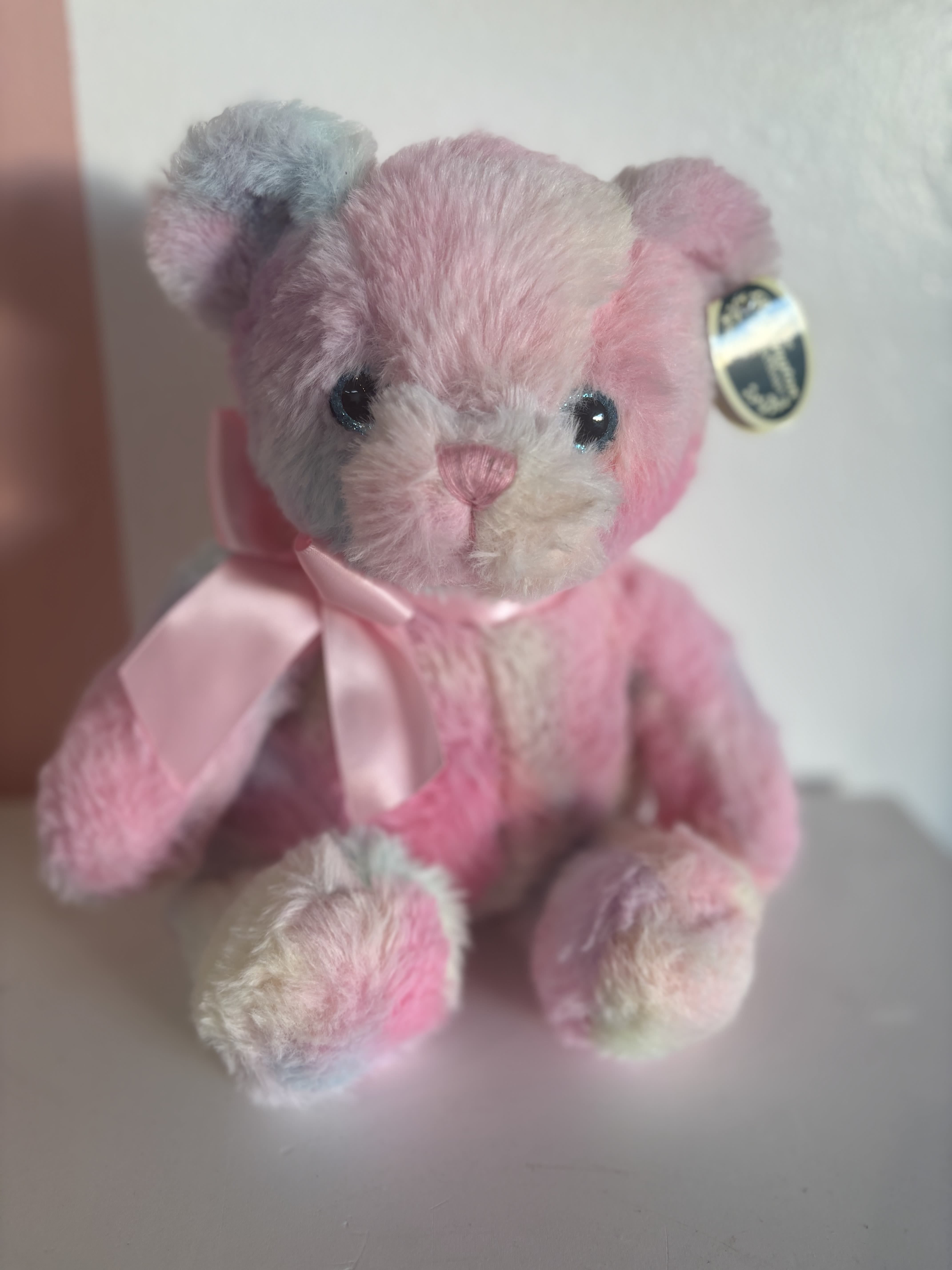 Cutie Bear - An adorable mixed pastel colored teddy bear.