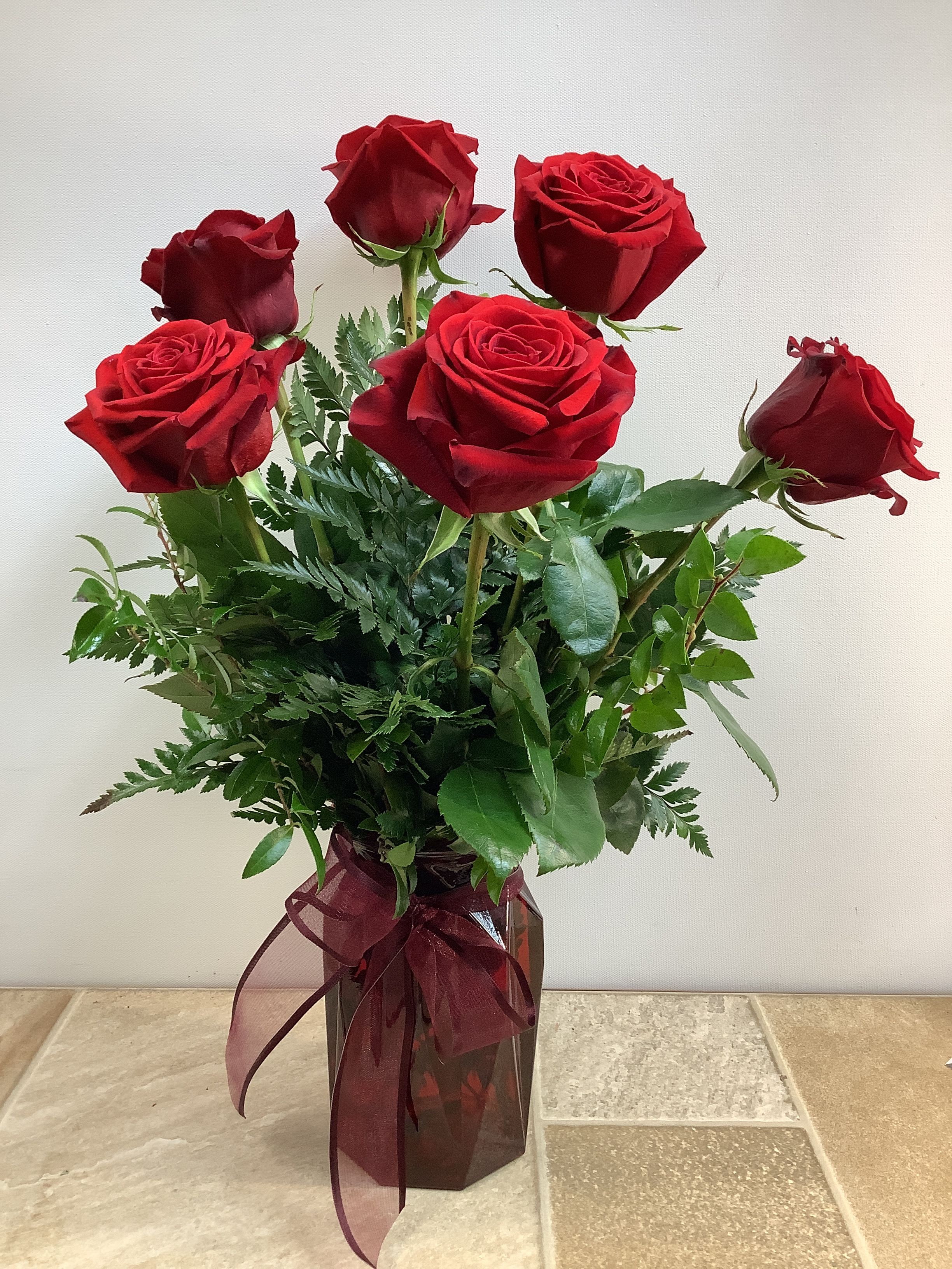 Vivian Vivian - Six premium long-stemmed roses. A classic beauty. A variety of other beautiful rose colors are available upon request.