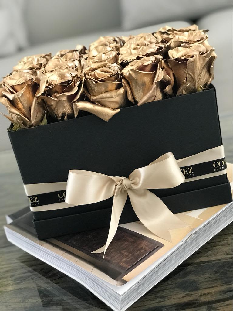 Gold Roses Box - Elegant box filled with approximately 20 gold roses, offering a luxurious and timeless gift. Perfect for special occasions, anniversaries, or expressing admiration. Order this stunning arrangement today and make a lasting impression!