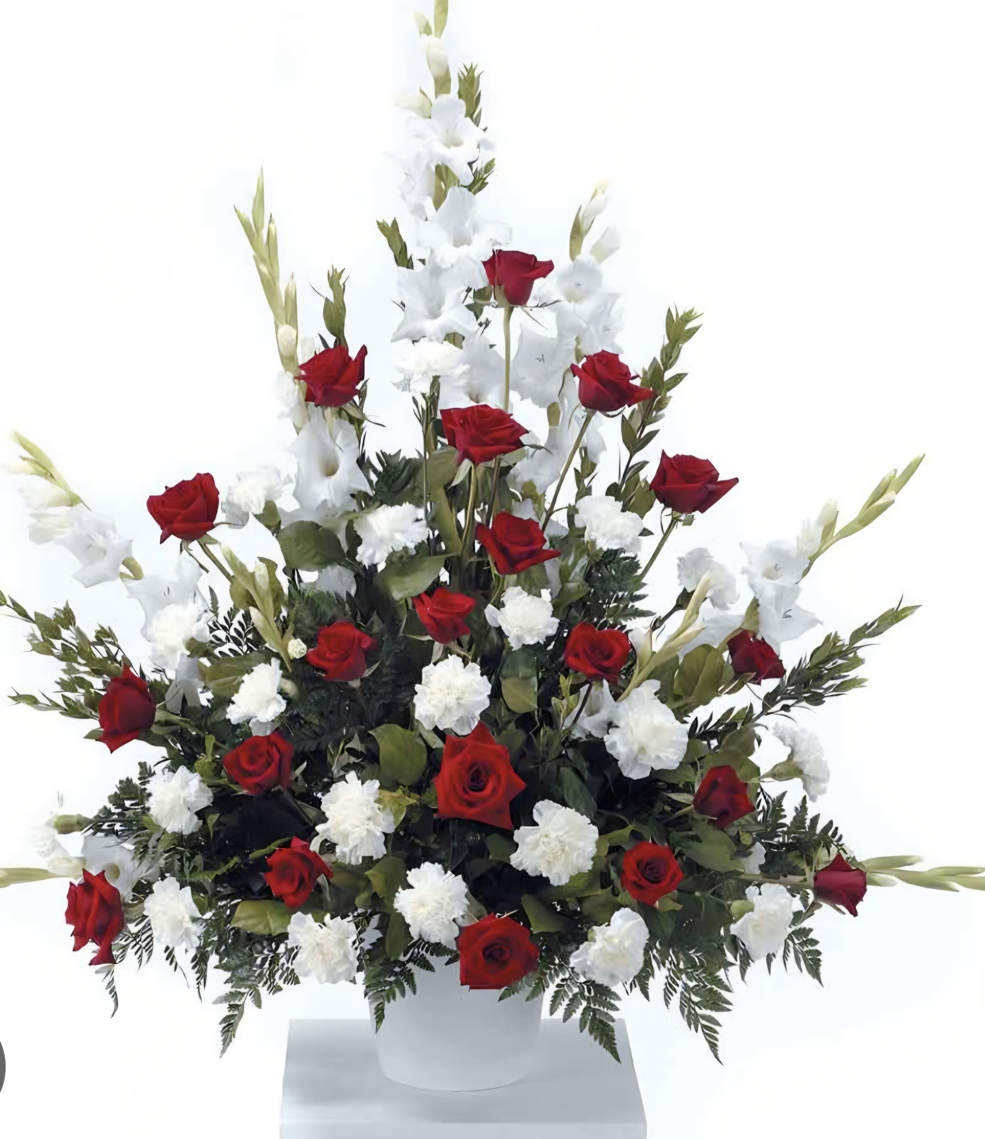 Classic Sympathy Classic Sympathy - This classic sympathy piece feature glads, roses and carnations.