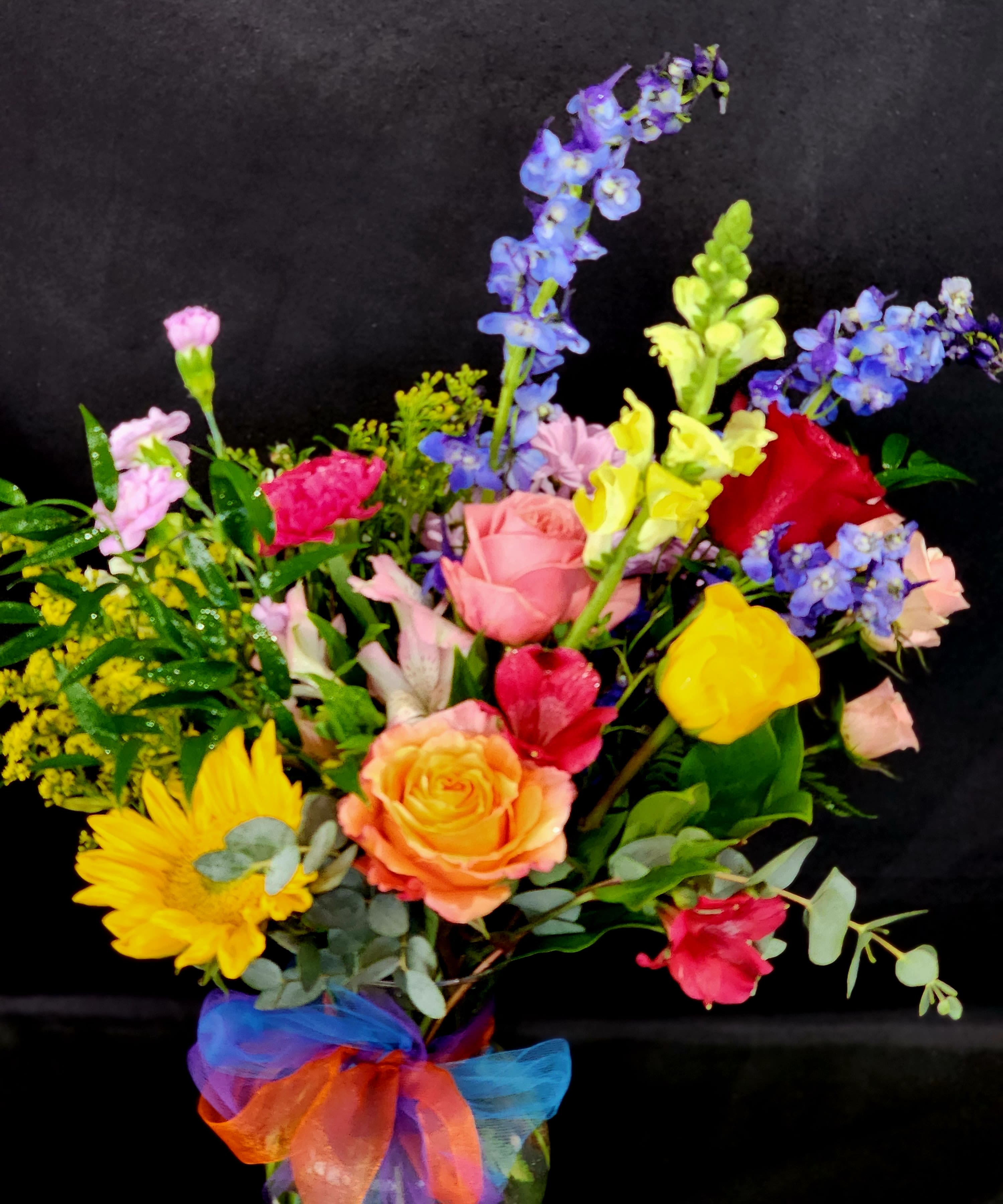 A Tucson Sunset - Bring Tucson's sunsets or sunrise into your home. Soft and warm arrangement to bring an uplifting glow to the one you care for.  