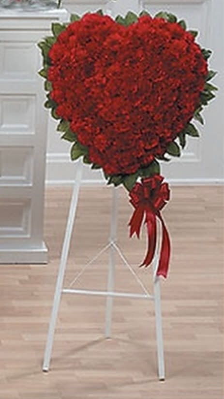 Red Heart Easel Red Heart Easel - This red heart easel features all red carnations. Perfect for any celebration of life/