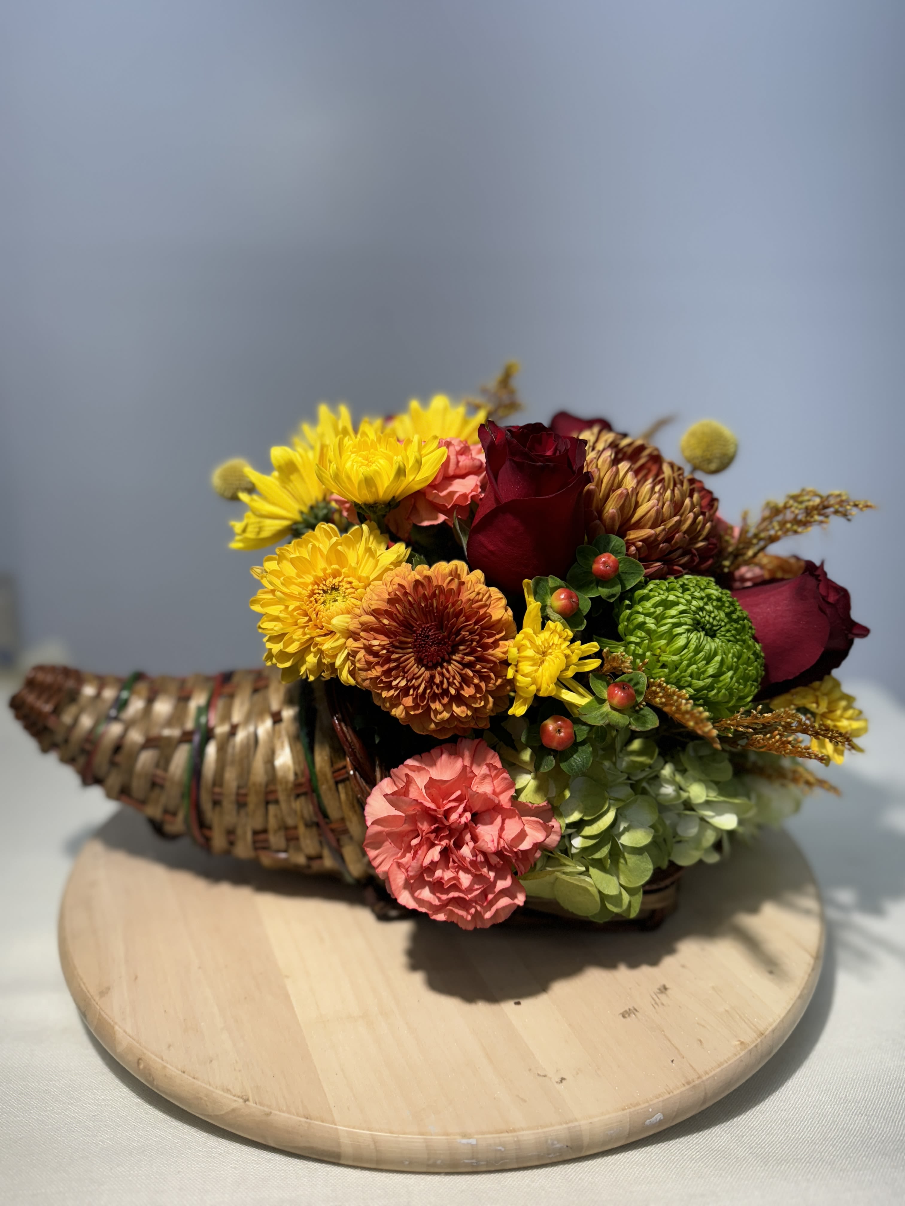 Curnucopia Thanksgiving center piece. - In classical antiquity, the cornucopia, from Latin cornu and copia, also called the horn of plenty, was a symbol of abundance and nourishment.