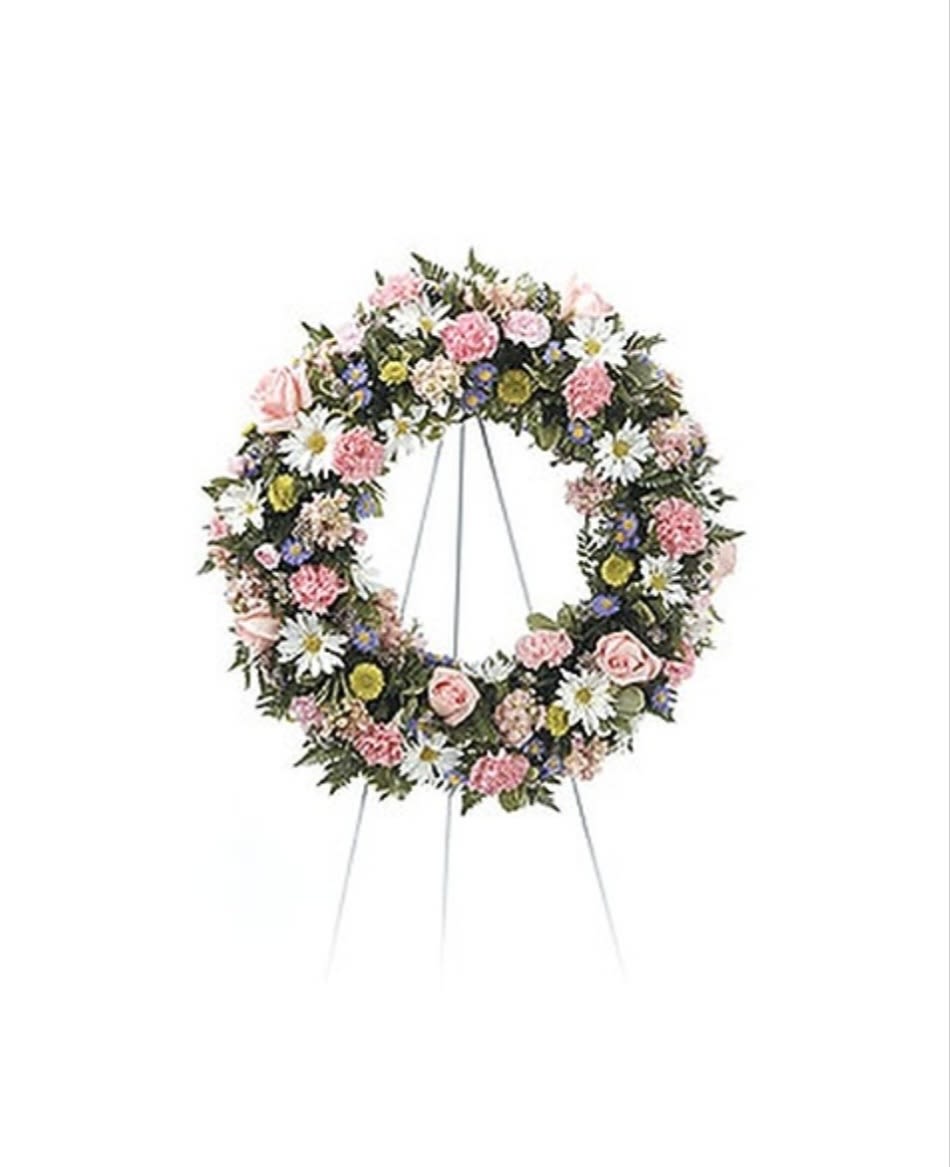 Wreath of Hope - This mixed wreath features soft colors of pinks lavenders, greens and whites.