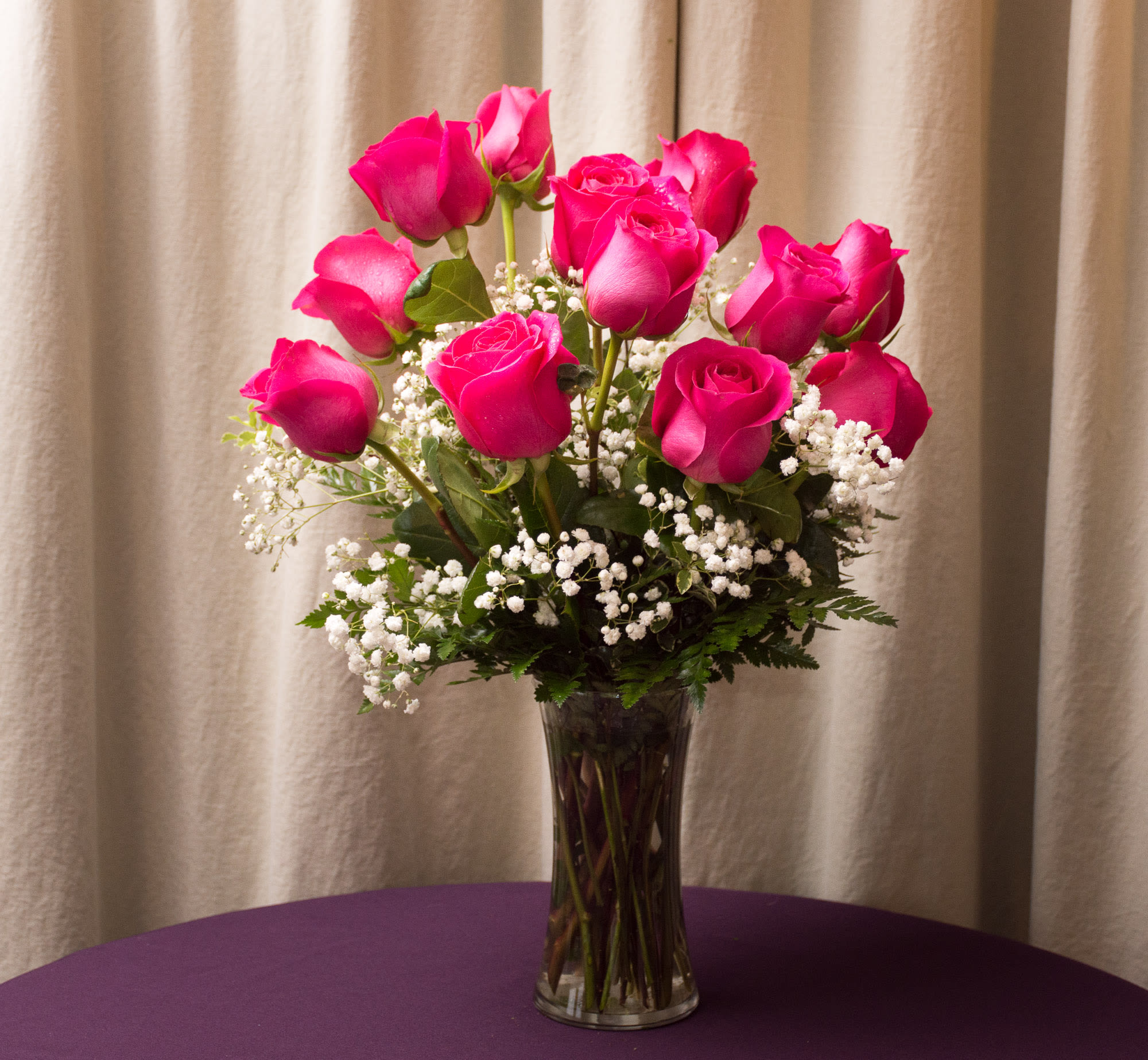 Hot Hot Hot - These beautiful Hot Pink roses will definitely let that someone special  know how you feel about them. 