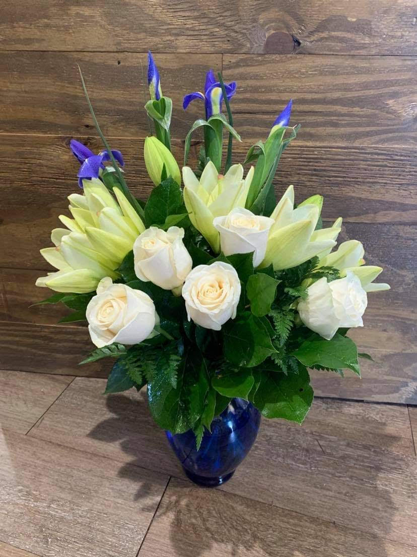 A New Day  A New Day  - Elegant arrangement including Lilies and Roses