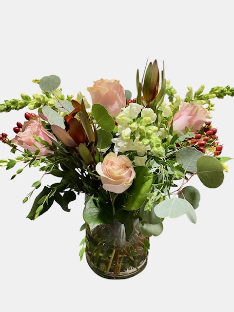 Cozy Fall - An artistic and Fall arrangement, this crowd pleaser is as interesting as it is impressive. Bright greens and an architectural design give this arrangement its unique appeal.  