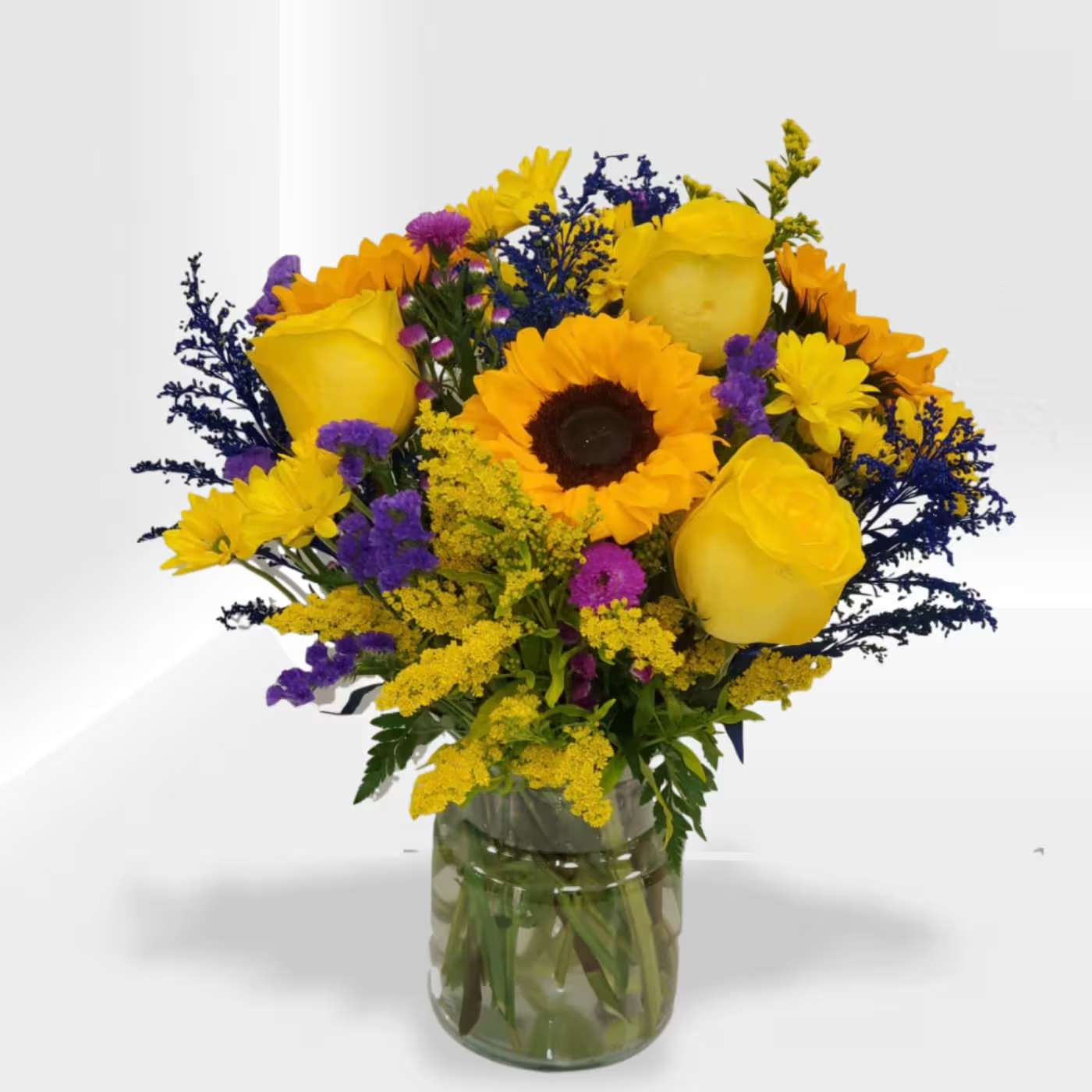 Late Night View Late Night View - Purple and yellow flowers, some sunflowers, roses, and fillers