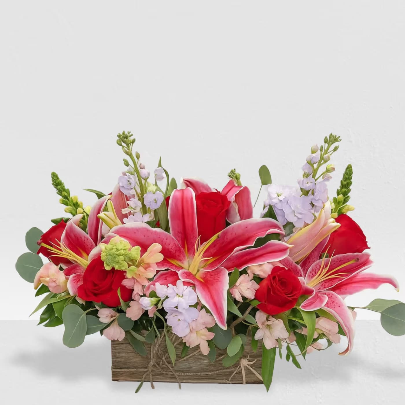 Pretty in Pink Pretty in Pink - A variety of hot and light pink flowers perfect for a friend, love one.