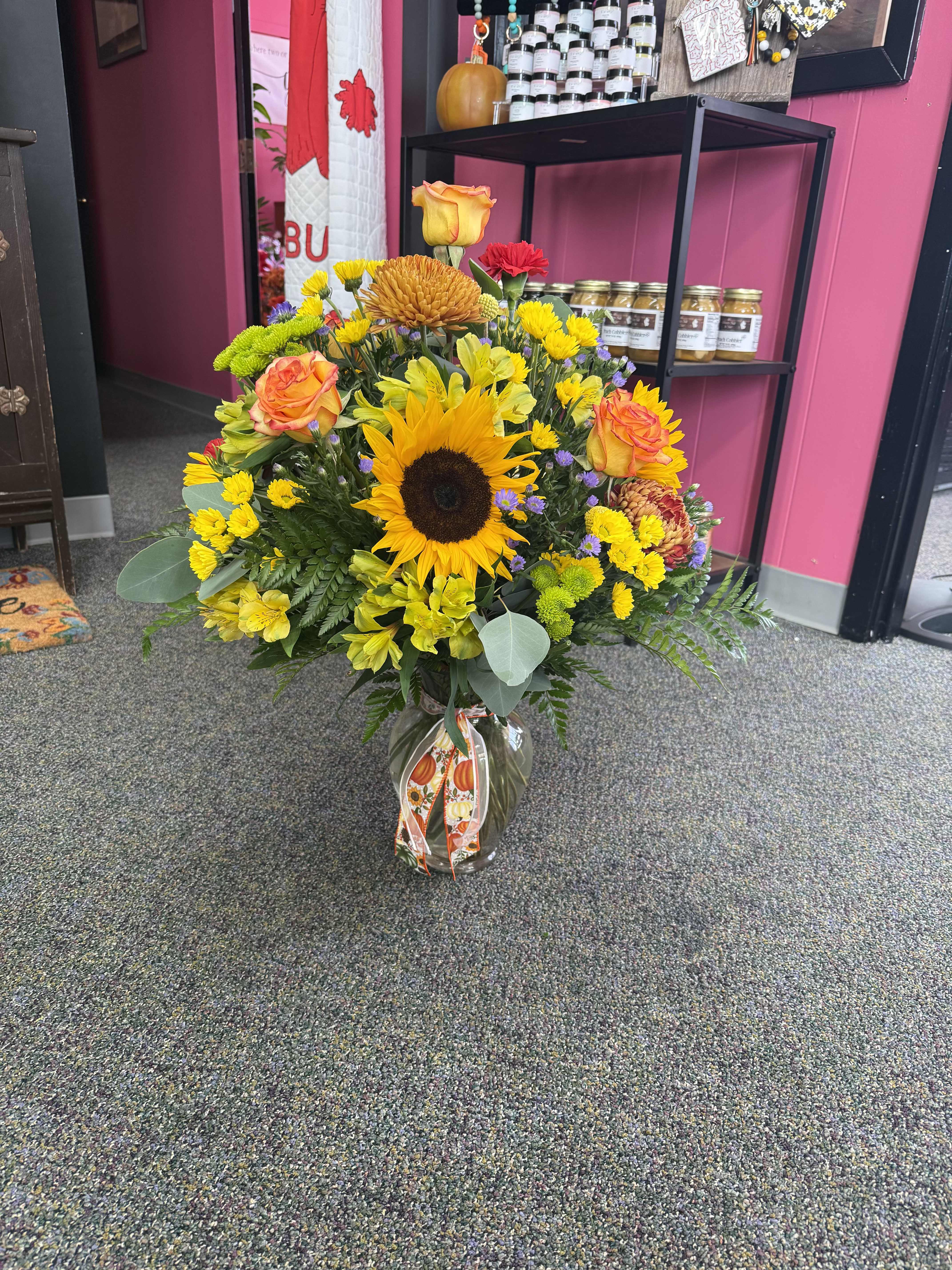 Large Vase Arrangement - Make a big statement with one of our large, full arrangements! Packed with a mix of fresh, seasonal blooms and greenery, this design is perfect for birthdays, anniversaries, sympathy, or just showing someone a little extra love. Each one is custom-made with bold color, texture, and style in mind — no two are ever exactly the same!  Designer’s Choice Call For Special Colors (870) 352-0273