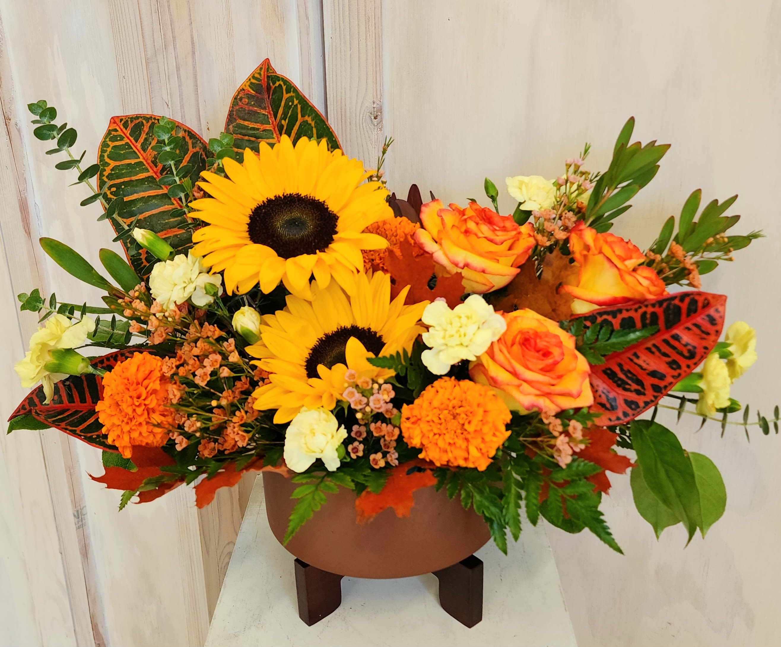 Autumn Planter Breeze - Copper container with a perfect Floral combination of sunflowers roses and fillers. 