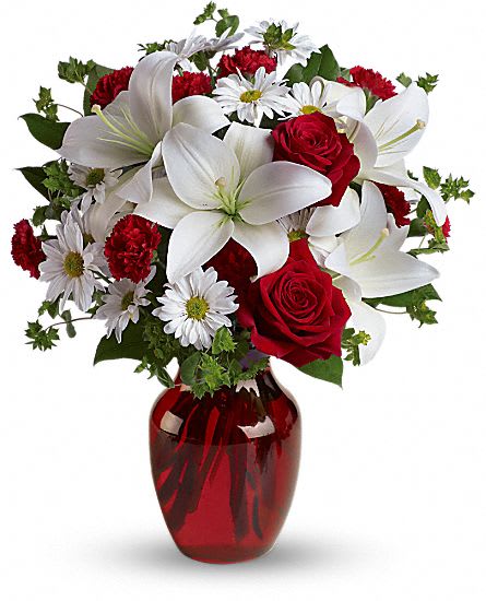 Be My Love - Red Roses accompanied by White lilies and daisies, red carnations in a glass vase. 
