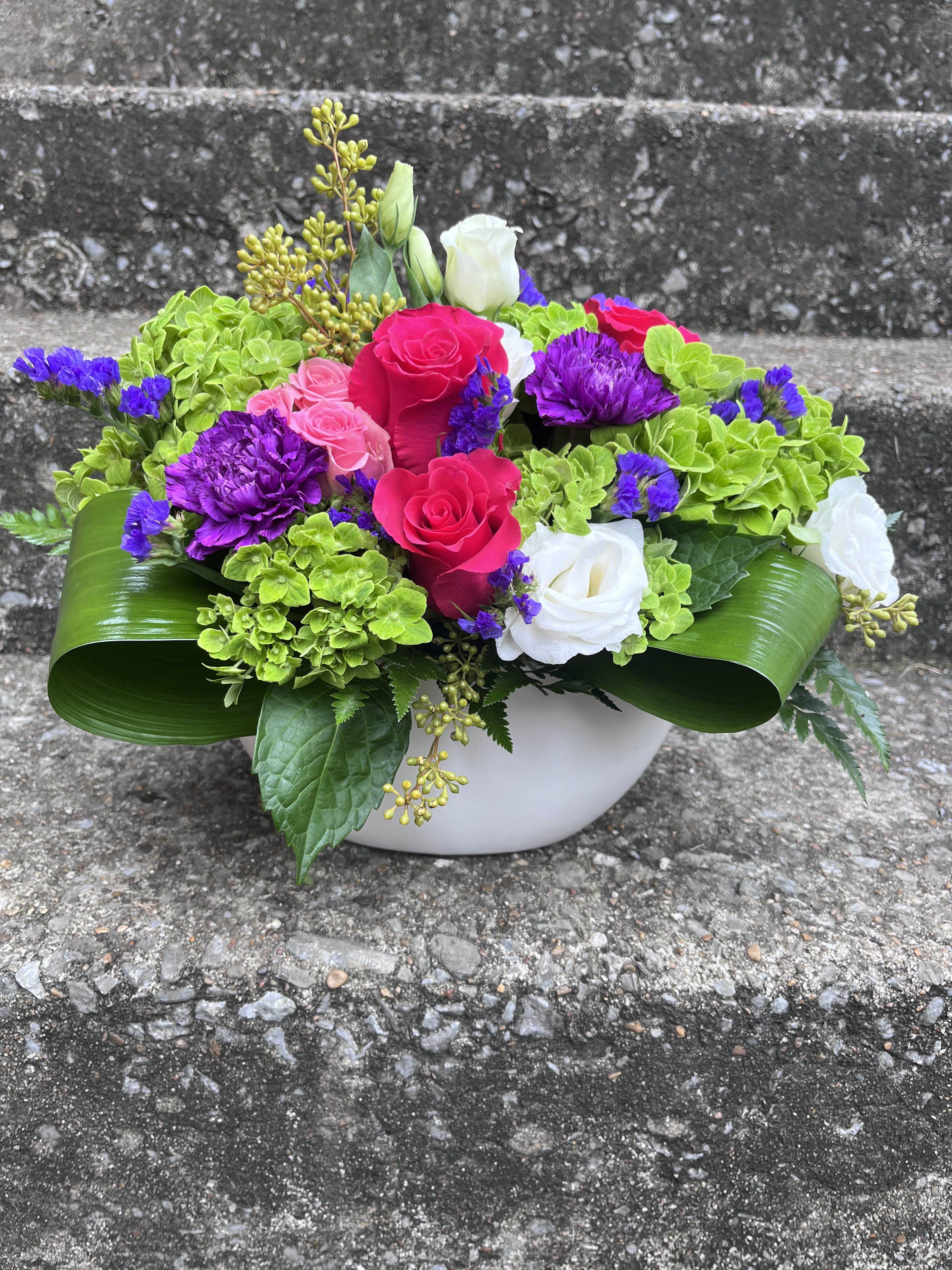 Deep Emotions  Deep Emotions  - This arrangement has hydrangea, roses, lisianthus, carnations, static and beautiful greenery.