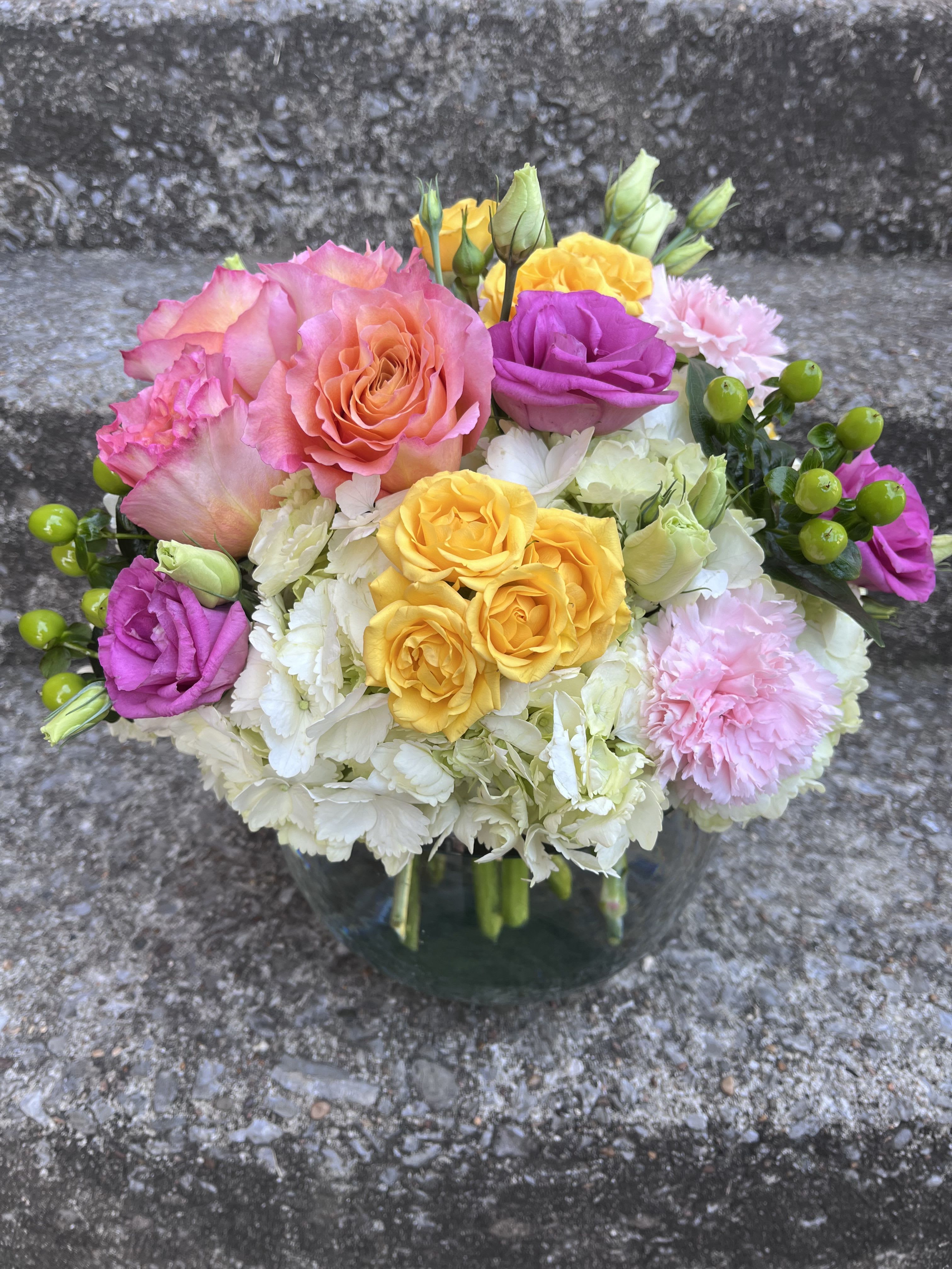 Precious Moments  Precious Moments  - This arrangement Is in a 8 inch bubble bowl It has hydrangeas, roses, spray roses’s, hypericum and lisianthus.