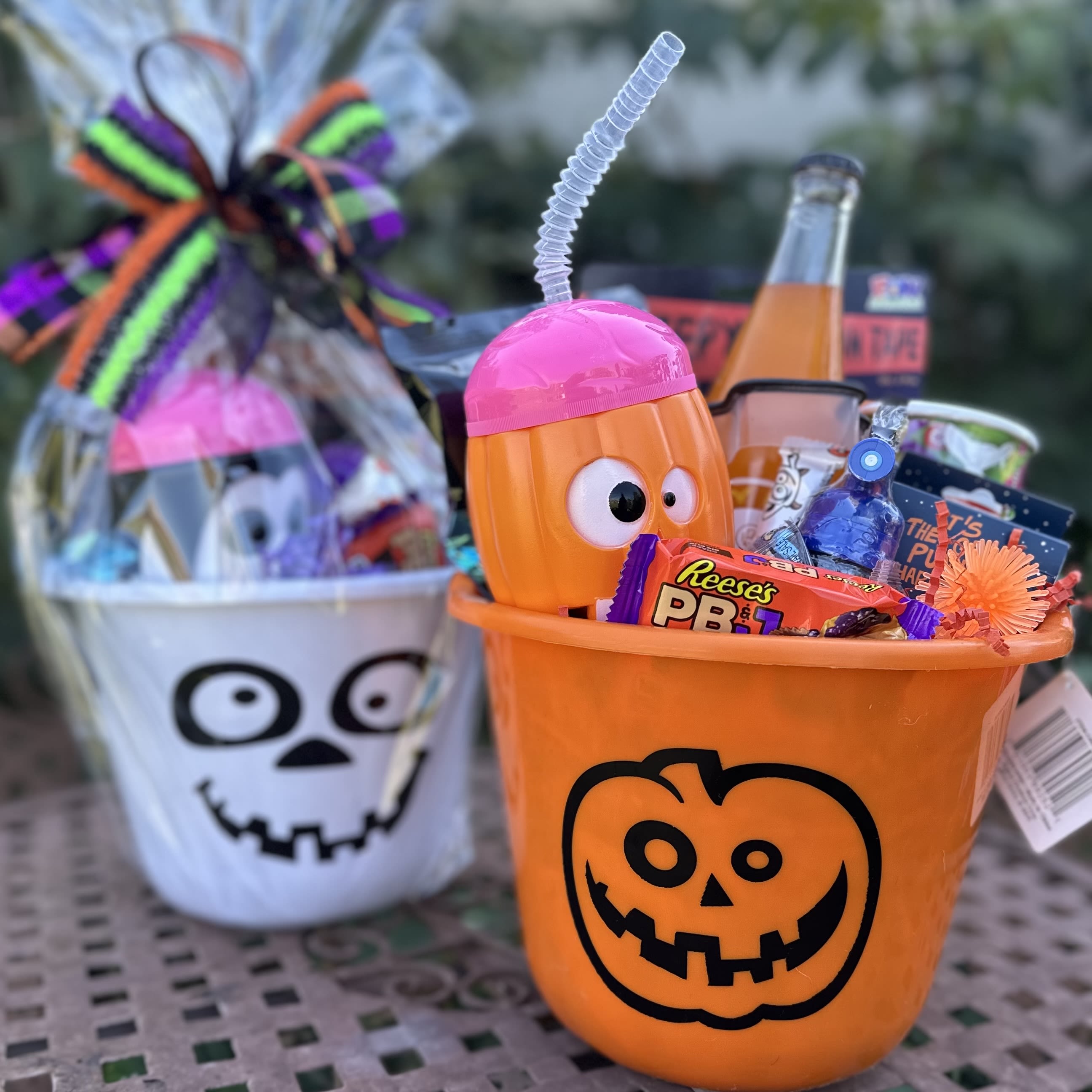 BOO BASKET - Treat you favorite Ghouls&amp; Goblins to something extra special this Halloween ! Our BOO baskets are packed with spooky sips, sweet treats and fun surprises