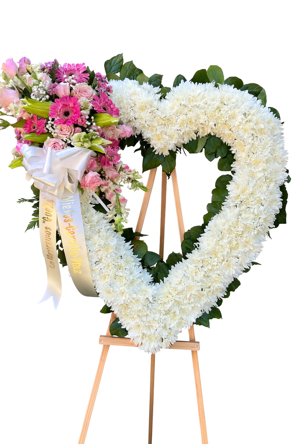 Celeste Heart  - A tender expression if love and remembrance, this heart shaped floral arrangement is a beautiful tribute to a cherished life accented with soft pink roses , lilys or spray roses and carnations symbolize grace, admiration and affection.  