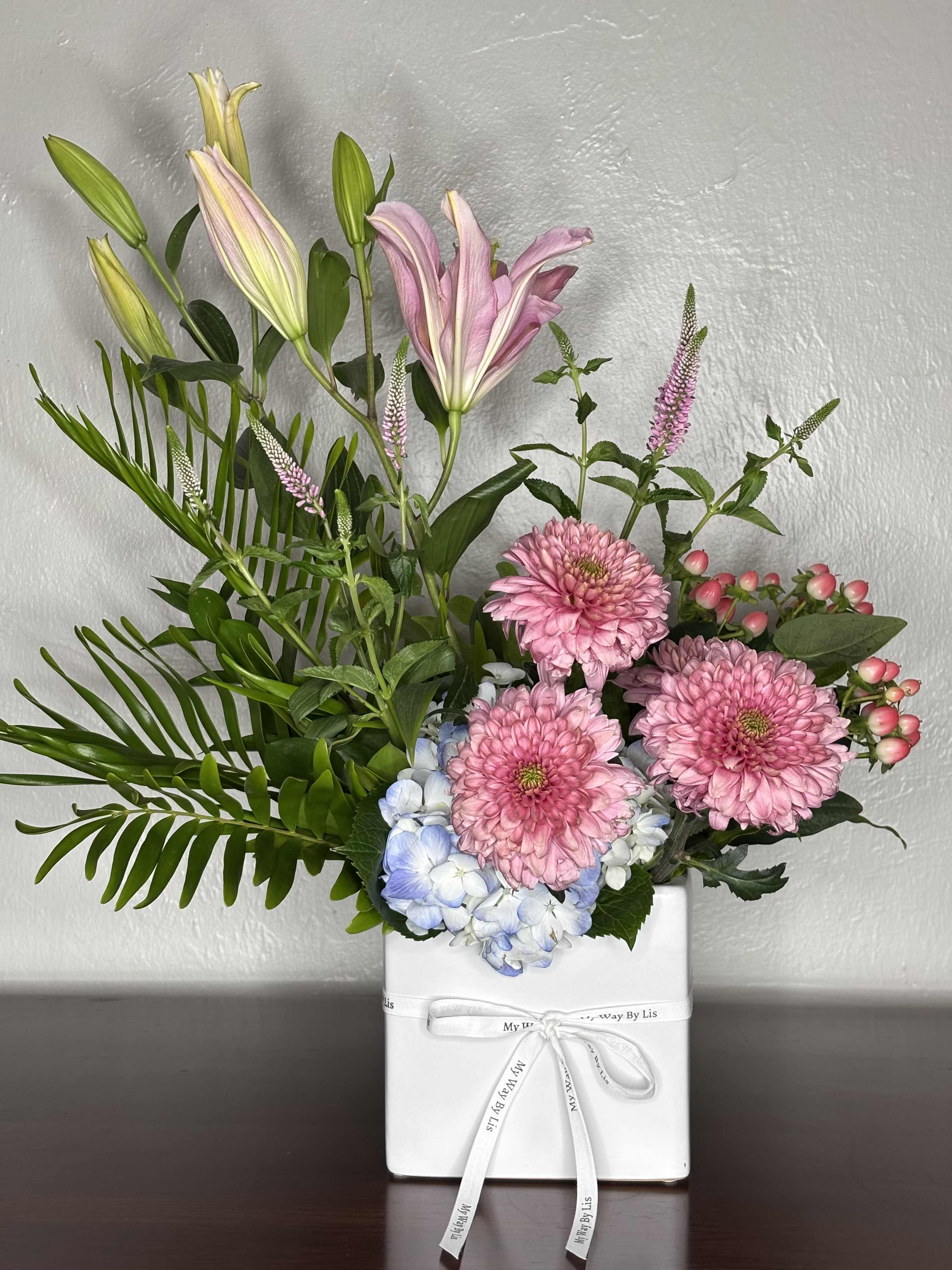 Always Lilies. - Sweet and romantic arrangement to convey love and gratitude on any occasion.  