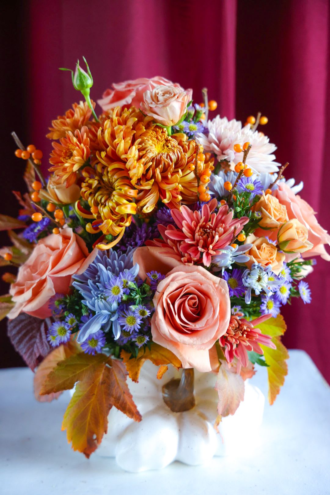 The Mirthful Thanksgiving Limited Edition Arrangement -   Custom, one of a kind floral arrangements by floral artist Stacy Leafsong.  Photos provide examples, and each arrangement &amp; vase is unique.  Arrangements will be delivered before 7pm, for specific delivery time please include in special instructions. On holidays, our busiest times, deliveries will be made by 7:30pm.