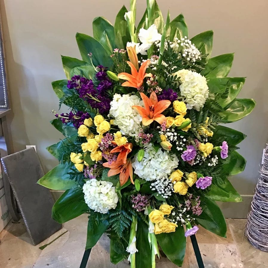 #61 REMEMBRERANCE TRIBUTE WREATH #61 REMEMBRERANCE TRIBUTE WREATH - Mix color spring   5FT - $280 - SHOWN