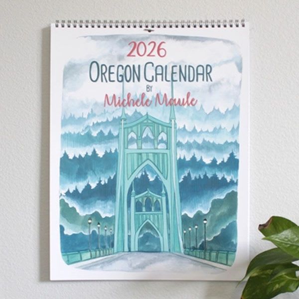 2026 Oregon Calendar - We are just loving this 2026 illustrated Oregon calendar by local Portland artist Michele Maule! Each month is dedicated to a site that is located here in Oregon.  Each illustration was hand drawn using gouache paint and is printed on a very lovely uncoated lightly textured vellum paper. Calendar measures 11&quot;x14.&quot;   These make excellent gifts for co-workers, friends, in-laws and that those hard to shop for people!  The months and their images are listed below:  January - Mt Hood February - Cannon Beach March - The Dalles April - The Steel Bridge May - Multnomah Falls June - Old Town Portland July - Punch Bowl Falls August -  Astoria-Megler Bridge September - Columbia River Gorge October - The Witch House of Forest Park November - Northwest Hills December - St Johns Bridge
