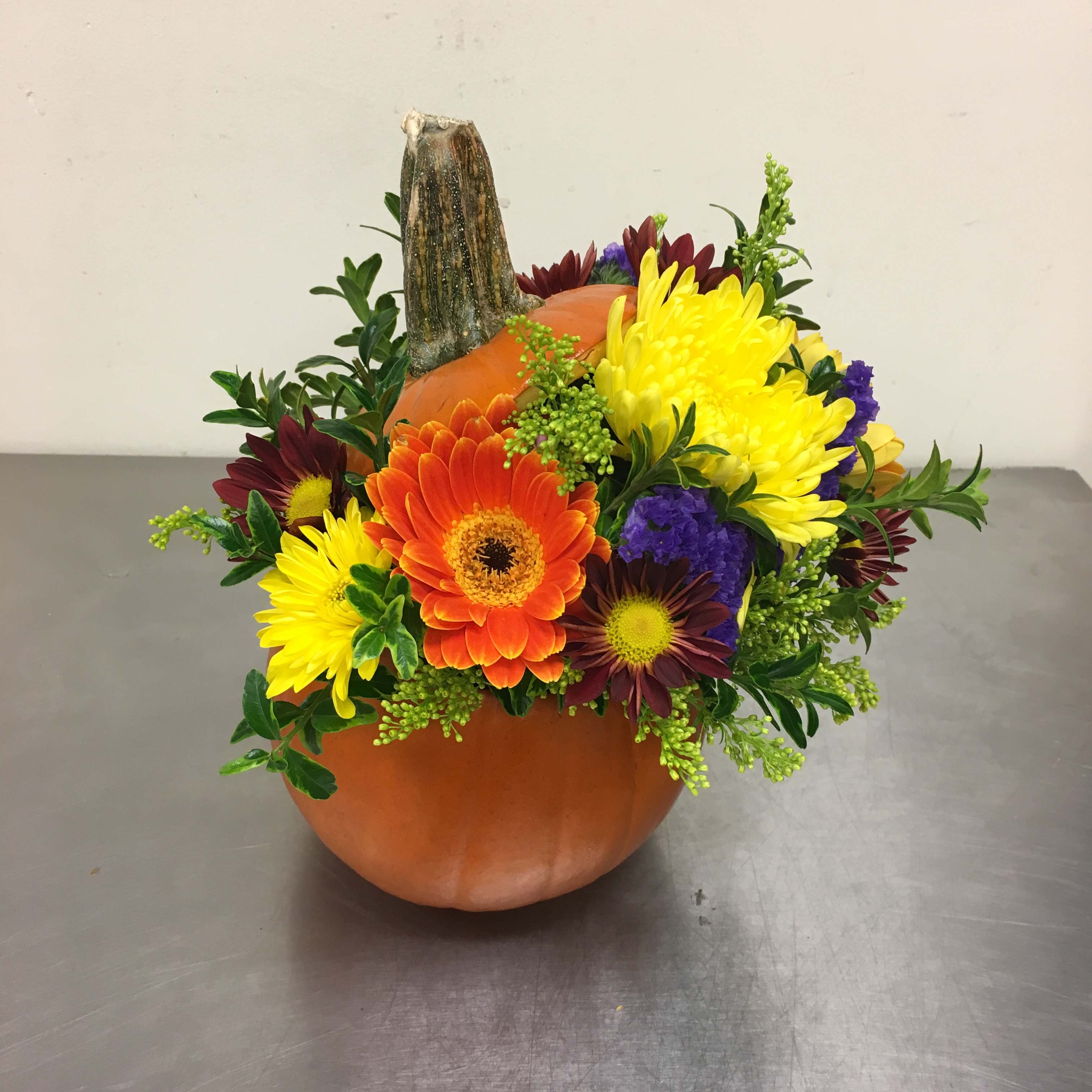 Hello Pumpkin!  - Send your loved ones a Pumpkin full for the freshest Fall Blooms! Including Lilies, Roses, Carnations, Fall Chrysanthemums, and more! 