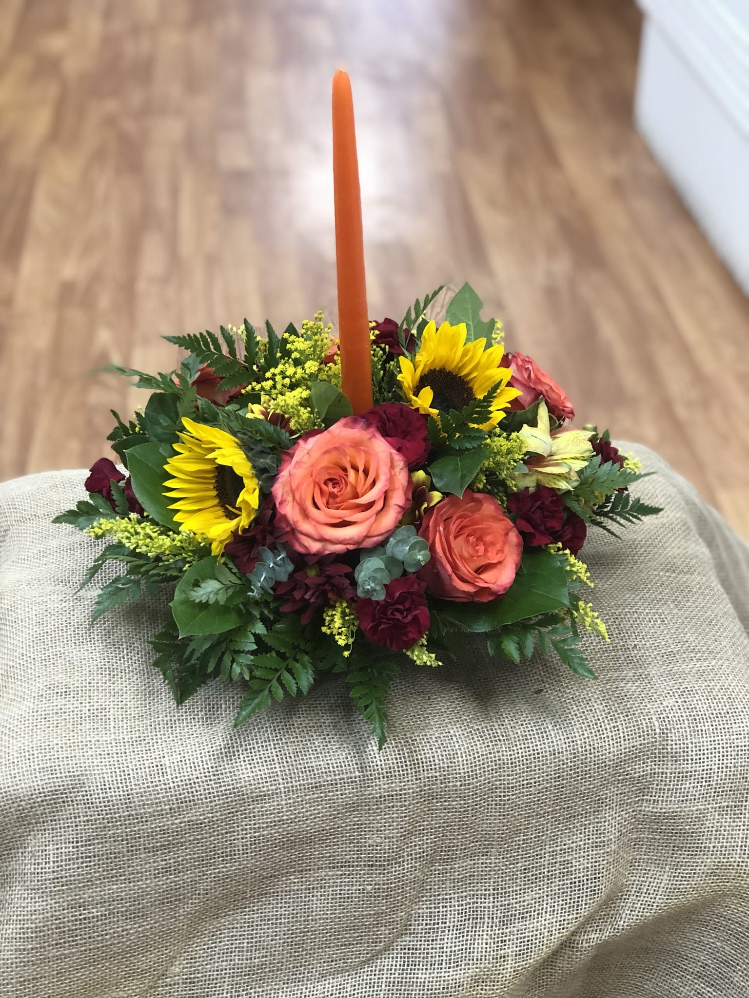 Thanksgiving centerpiece Thanksgiving centerpiece - This simple but yet elegant centerpiece is bound to catch the eye of anyone coming in the house with its single candle and vibrant colors