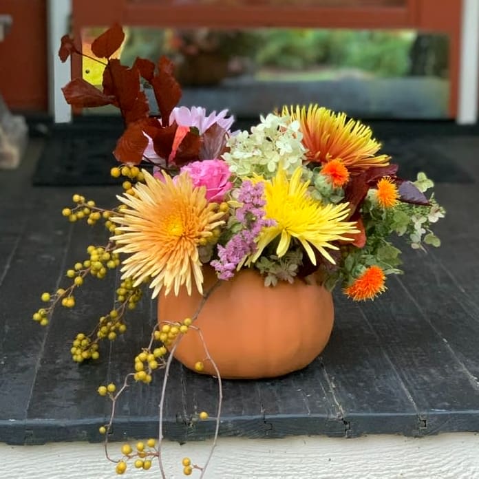 Pumpkin Pumpkin - Sweet ceramic pumpkin jar, complete with lid for use after the flowers are gone. Filled with Varying Seasonal Mix based on availability. If you have a special request please let us know!