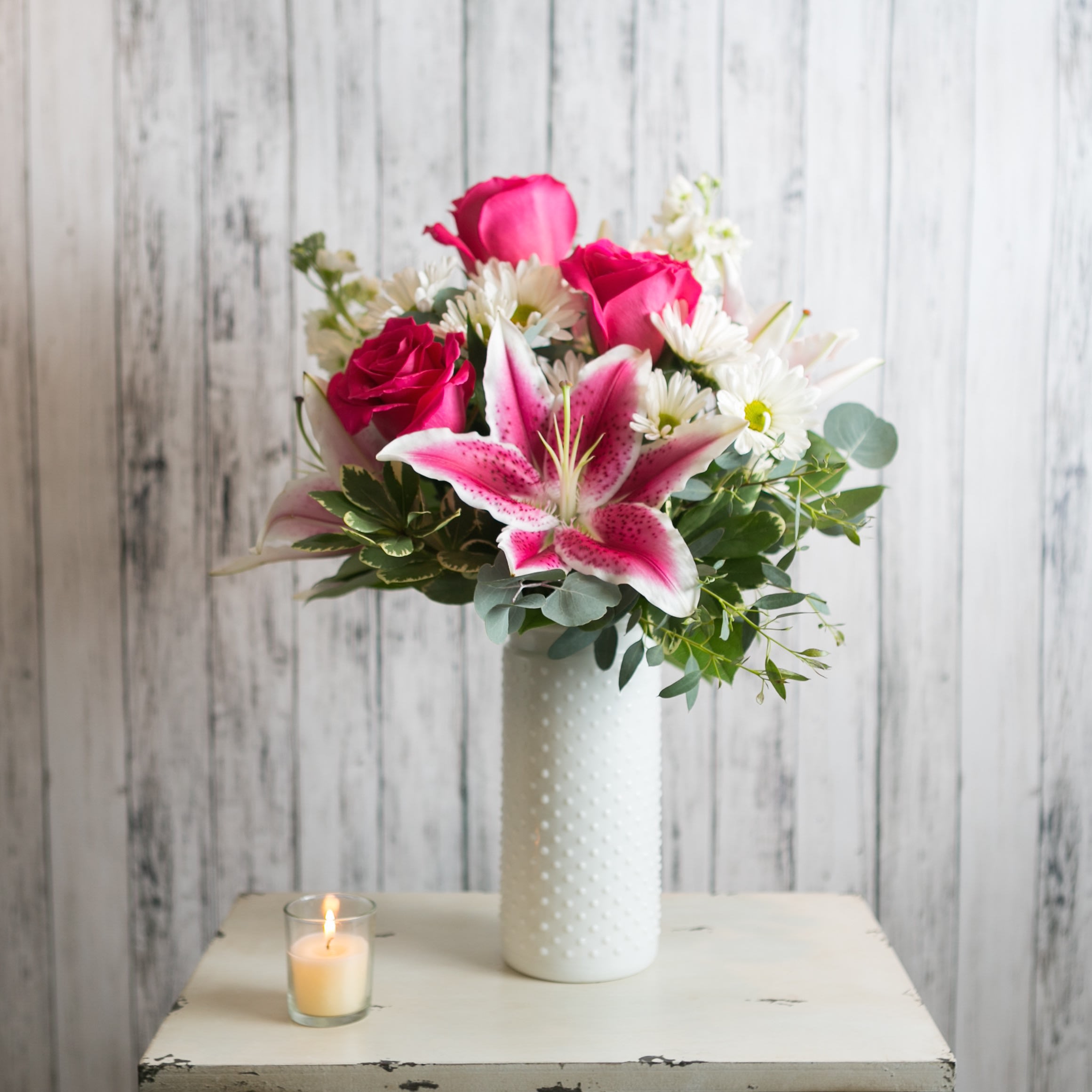 Posy - Elegant &amp; bright; this pink and white bouquet of lilies, stock and roses is sure to please no matter the occasion.  Approximate Dimensions: 20&quot; H x 14&quot; W
