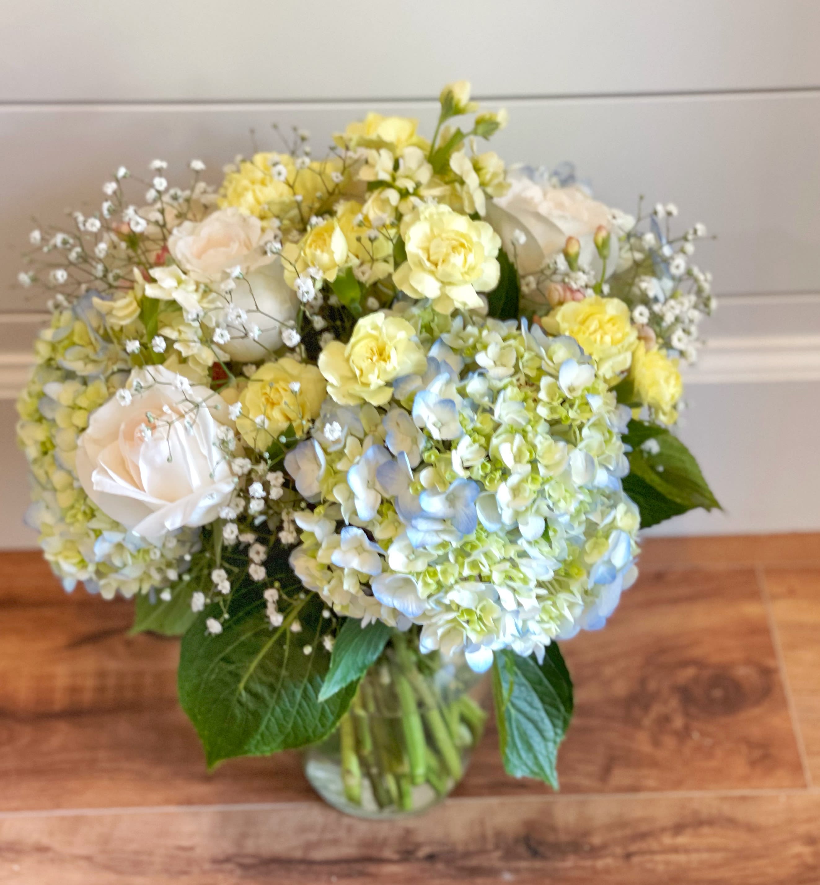 English garden in pastels  - Hydrangeas, roses and other seasonal flowers in pastel colors. 
