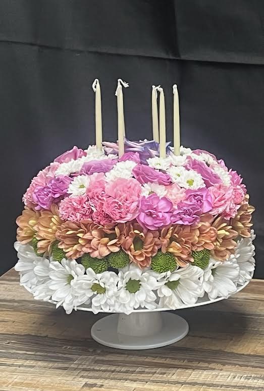 Petal Party Cake - A festive floral arrangement shaped like a birthday cake—perfect for celebrating in full bloom!