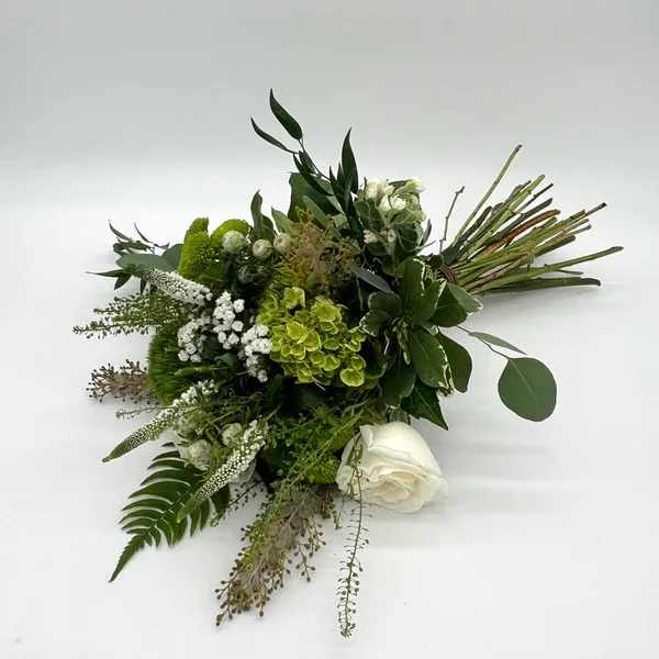 Go Birds! - GO BIRDS! Did somebody say Super Bowl Champs? A beautiful green and white bouquet of flowers! Perfect for watch parties or as a thank you to the host! Standard loose wrapped bouquet is pictured.