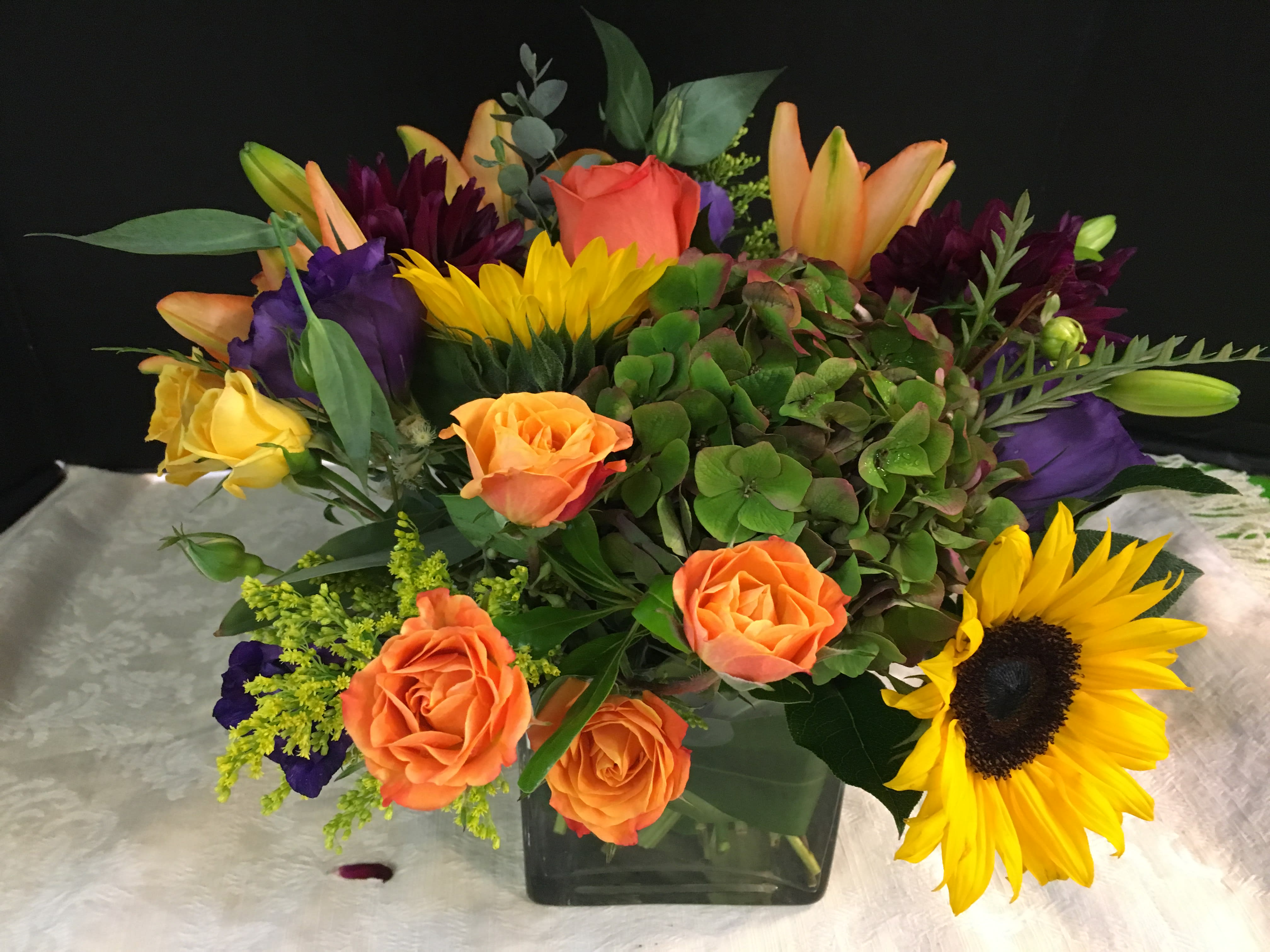Fall  Dinner Centerpiece - Orange Roses, Sunflowers, Fancy Hydrangea, Mixed Roses, Purple  Lisianthus ,Orange Lilies,Solidago