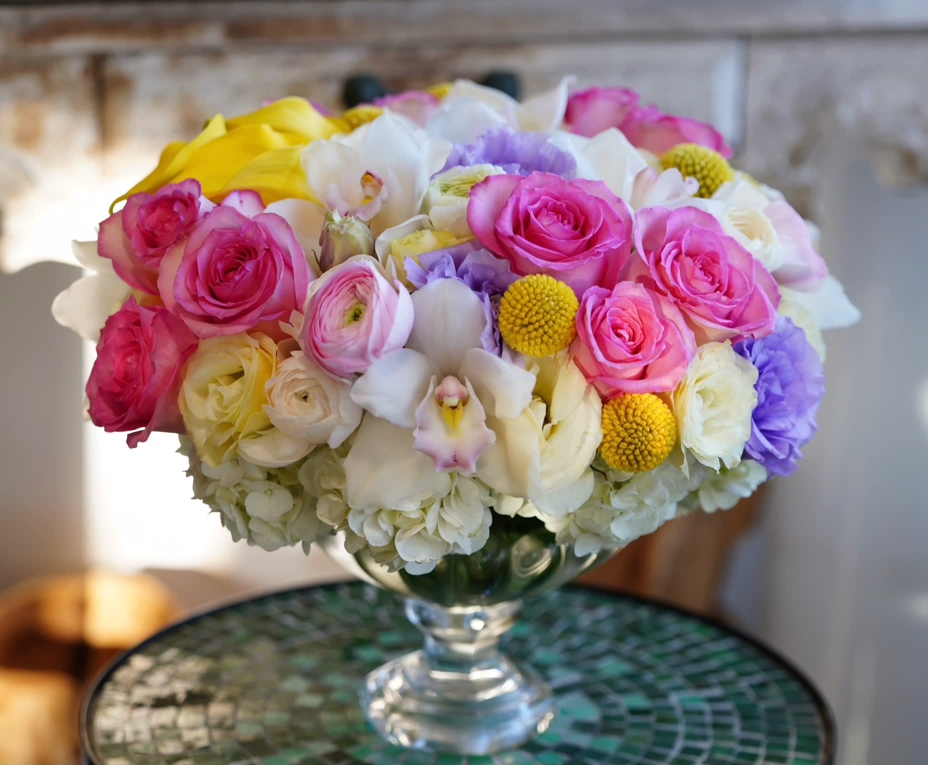 Todos Santos  - Roses, Hydrangea, Calla, Cymbidium, and more in custom gold color vase.
