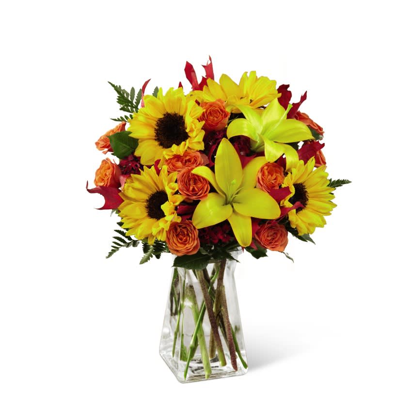 Bright Fall Colors! - Sunflowers, lilies, and roses make a statement at this time of year! COLORS AND VARIETIES WILL VARY.
