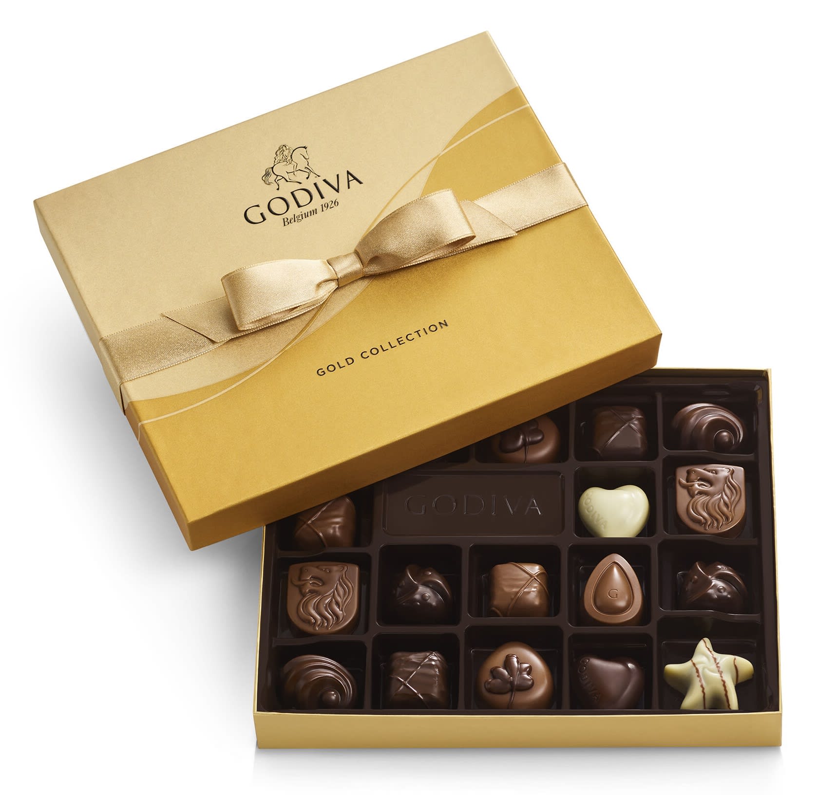 Godiva Premium Chocolates (18pc) Godiva Premium Chocolates (18pc) - Godiva Premium Chocolates (18pc) Experience the ultimate indulgence with the Godiva Premium Chocolates. This luxurious assortment includes 18 pieces of Godiva's finest chocolates, each one crafted to perfection to provide a truly delightful experience. Key Features: Premium Quality: Made with the finest ingredients, Godiva's chocolates are known for their rich, smooth texture and exceptional taste. Variety of Flavors: This assortment includes a selection of Godiva's most popular chocolate pieces, offering a variety of delicious flavors in every box. Elegant Presentation: Each piece is carefully crafted and elegantly packaged, making it perfect for gifting or enjoying as a special treat. Perfect for Any Occasion: Ideal for birthdays, anniversaries, holidays, or any celebration where you want to indulge in premium chocolates. 18 Pieces: This assortment includes 18 delectable chocolate pieces, ensuring there's plenty to savor and share. Treat yourself or someone special to the exquisite taste of Godiva Premium Chocolates. Each piece is a testament to Godiva's dedication to quality and craftsmanship, providing a memorable and indulgent chocolate experience.