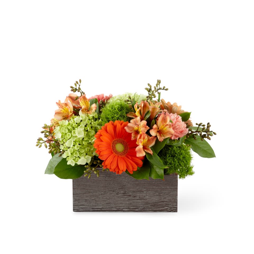 D01 - Hello, Gorgeous Bouquet - Rustic woodgrain box contains a brilliant mix of hydreangea, gerbera daisies, alstroemeria, carnations, and assorted greens.  Fantastic as a centerpiece!