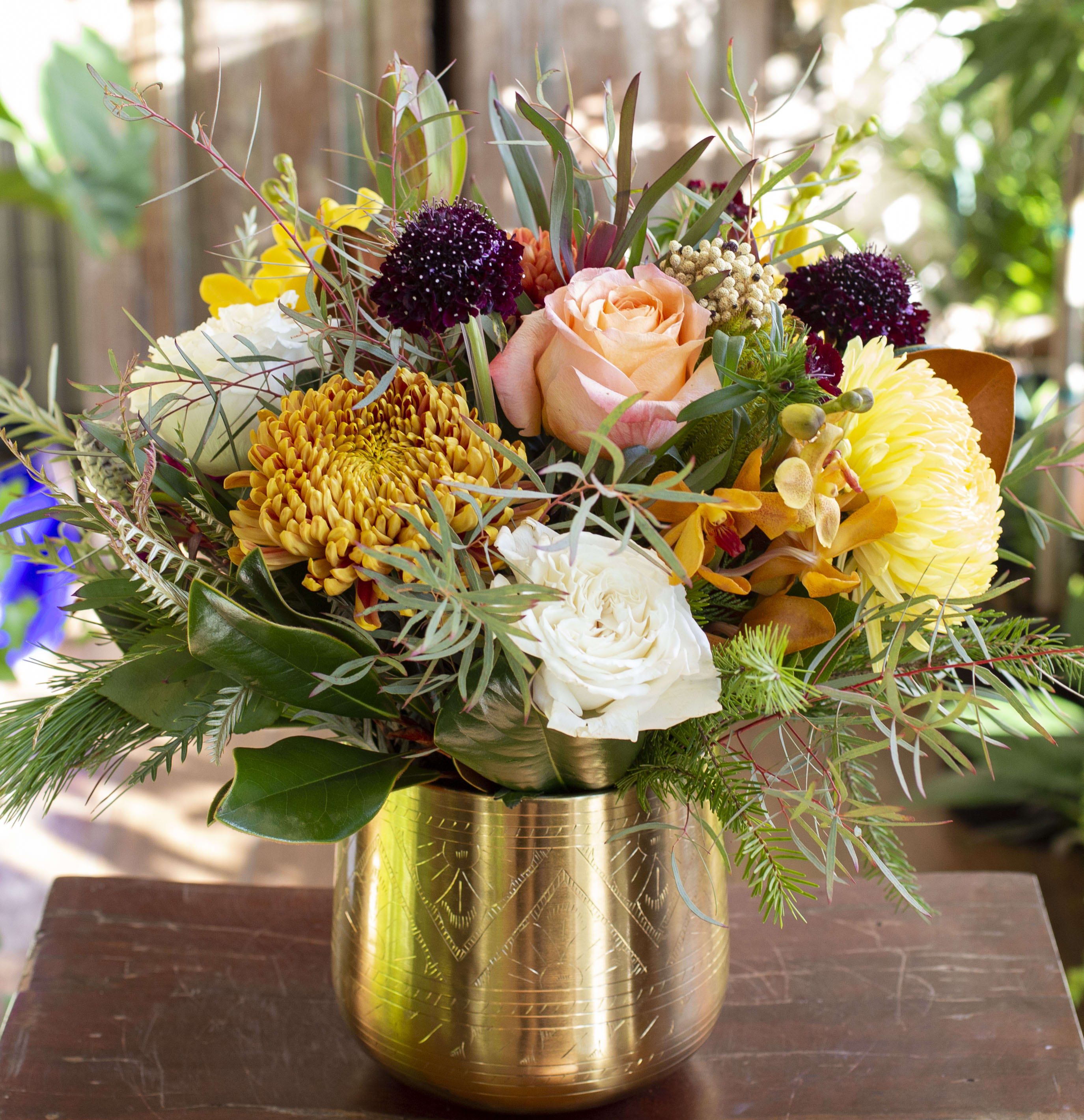 Matilda - Seasonal and festive flowers in a gold metal container