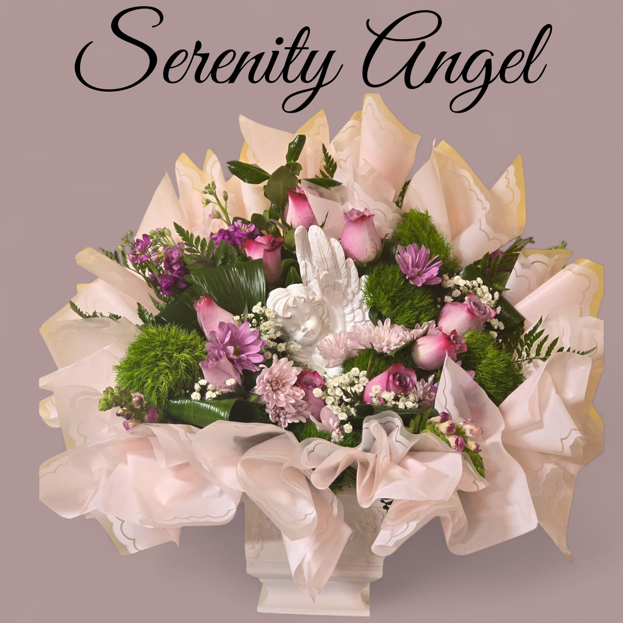 Serenity Angel Serenity Angel - A heartfelt sympathy arrangement featuring soft pink and lavender blooms surrounding areas delicate angel figurine. This elegant design offers comfort peace and a lasting expression of love and remembrance.
